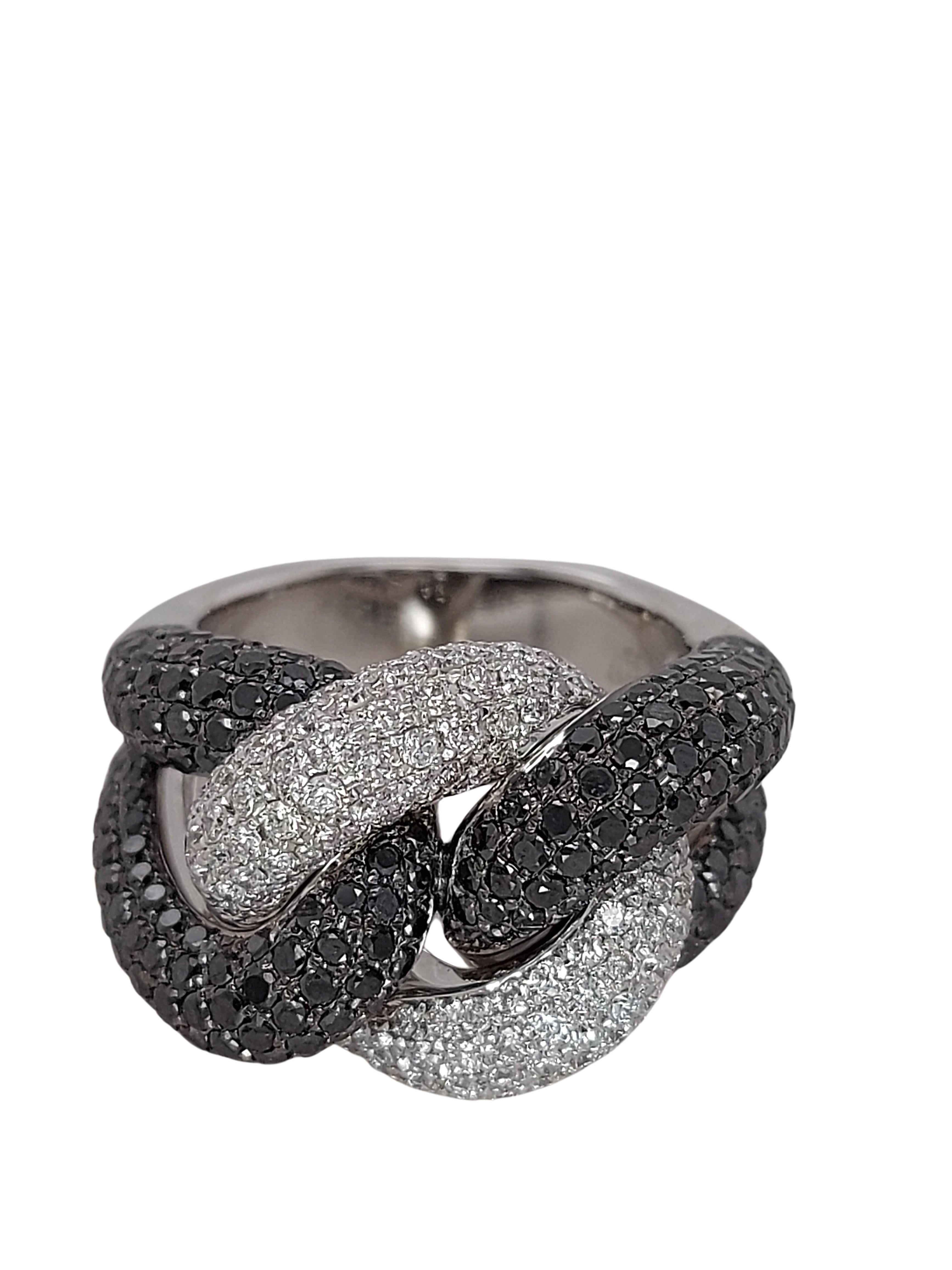18 White Gold Ring With 1.17ct White and 2.30ct Black Diamonds

Diamonds: Brilliant cut diamonds, White diamonds 1.17ct & black diamonds 2.30ct

Material: 18kt white gold

Ring size: 55.1 EU / 7.25 US ( Can be resized for free)

Total weight: 15.6