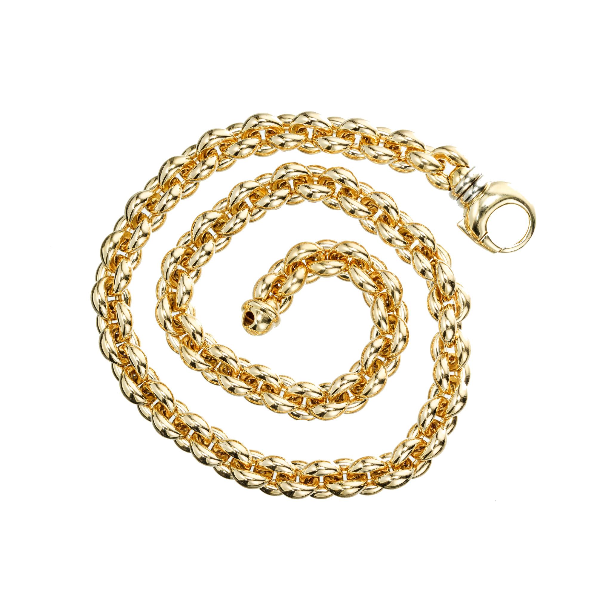 1980's 3 Dimensional Italian chain necklace, a timeless piece of craftsmanship and elegance. Meticulously crafted in Italy, this necklace is made from rich 18 yellow gold links. The three-dimensional design adds a unique element to this already