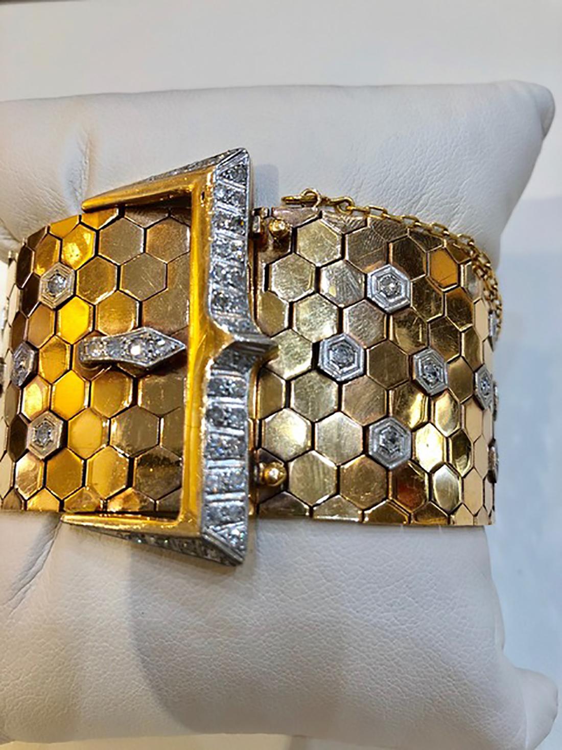 18 Carat Yellow Gold Hexagonal Bracelet yellow gold with approx. 2.25cts. of diamonds.
8″ long – 1.5″ wide