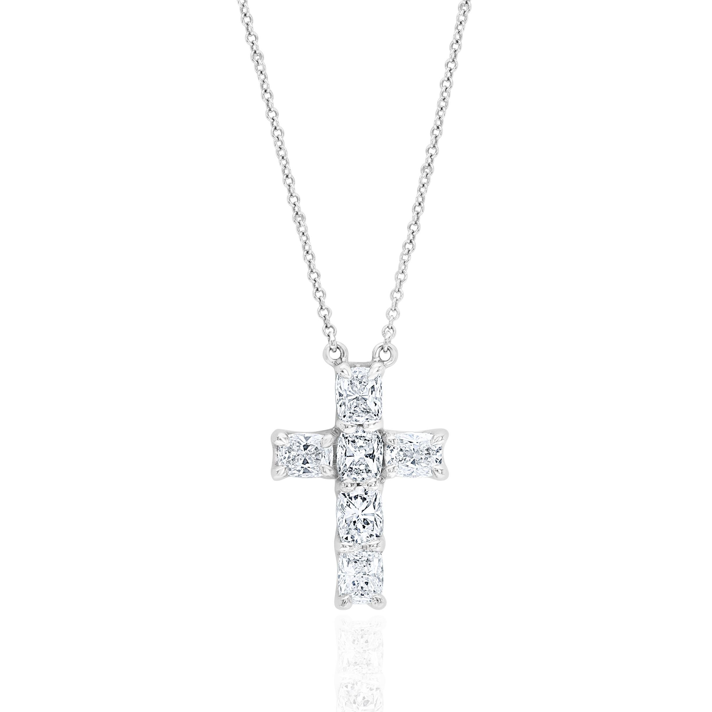 6 elongated Cushion Cut Diamonds make up this beautiful and understated cross. Stones weighing approximately 0.30 carat each for a total of 1.80 Carats.
Stones are G-H color and VS Clarity.
Set in 18 Karat White Gold.