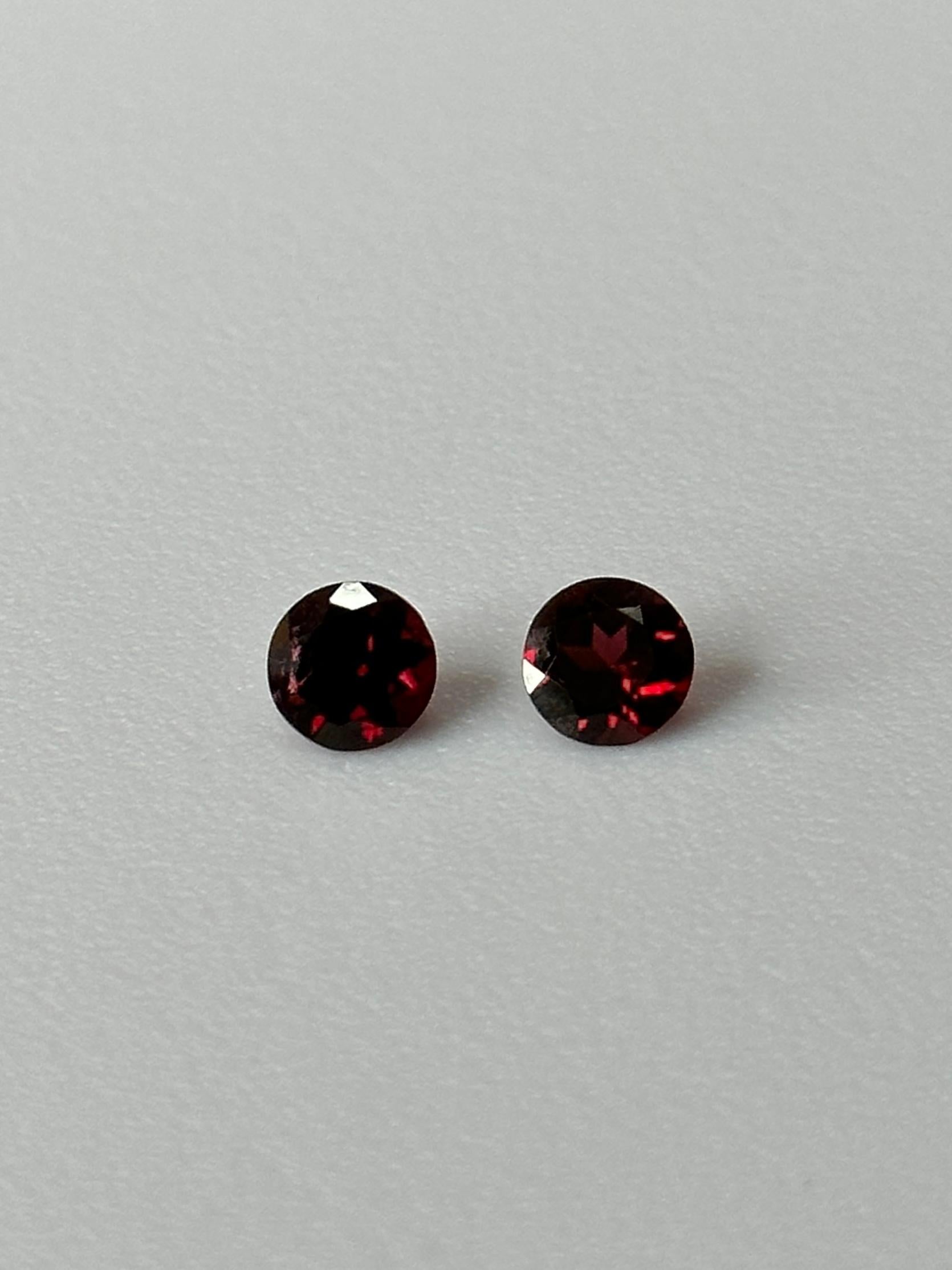 A glamorous pair of Brilliant Cut Pyrope-Almandine Garnets.
Garnet is quite a common mineral that can be found all throughout the world in various different colors ranging from green to red in the color spectrum.
However Pyrope garnets are