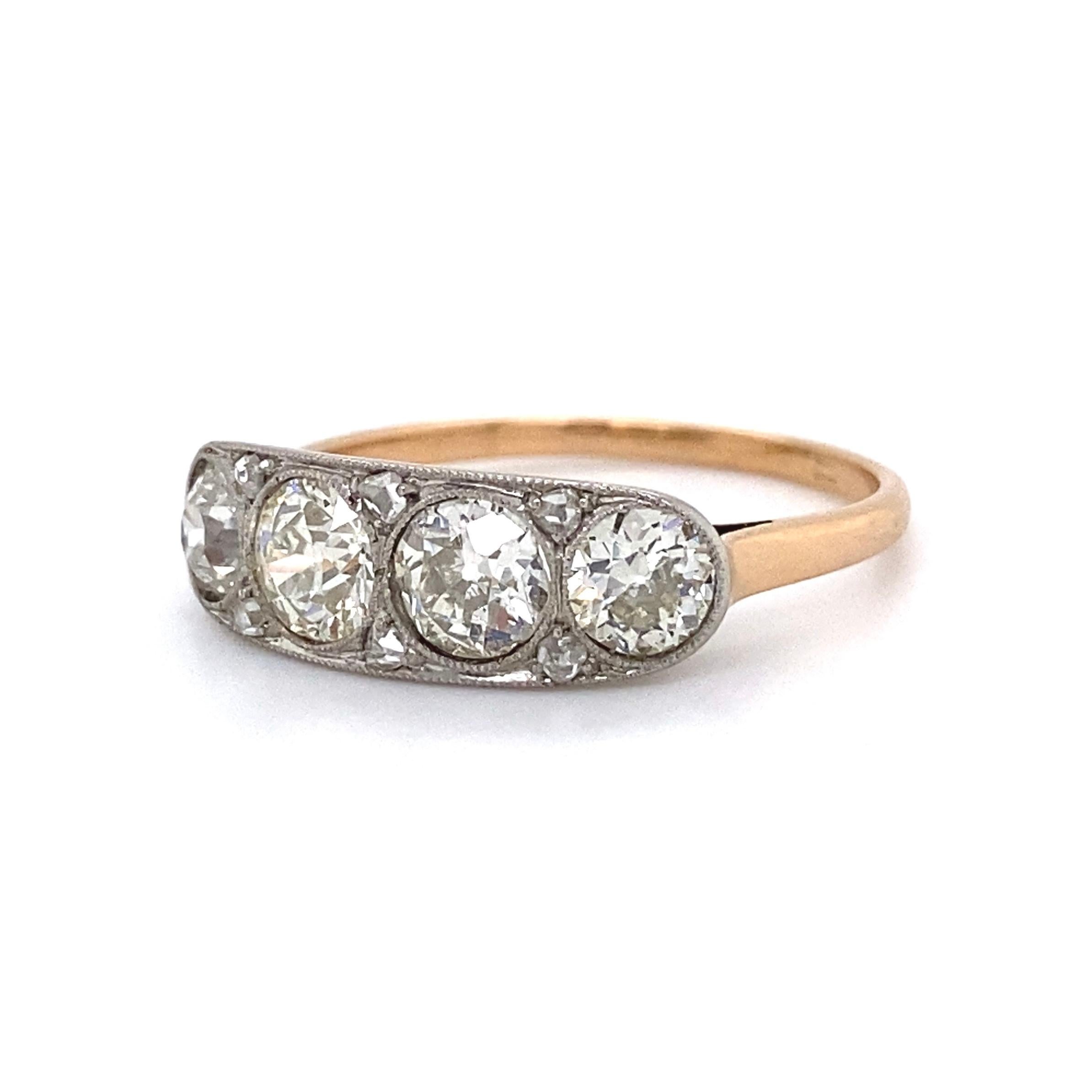 Women's Edwardian Diamond Four-Stone Platinum Ring Estate Fine Jewelry
