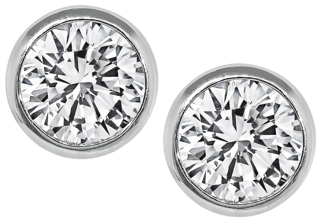 This elegant pair of platinum stud earrings feature sparkling IGI certified round cut diamonds that weigh 1.80ct. The color of the diamonds is I-J with SI1-SI2 clarity and VS1-VS2 clarity. 


Inventory #93853WWBS