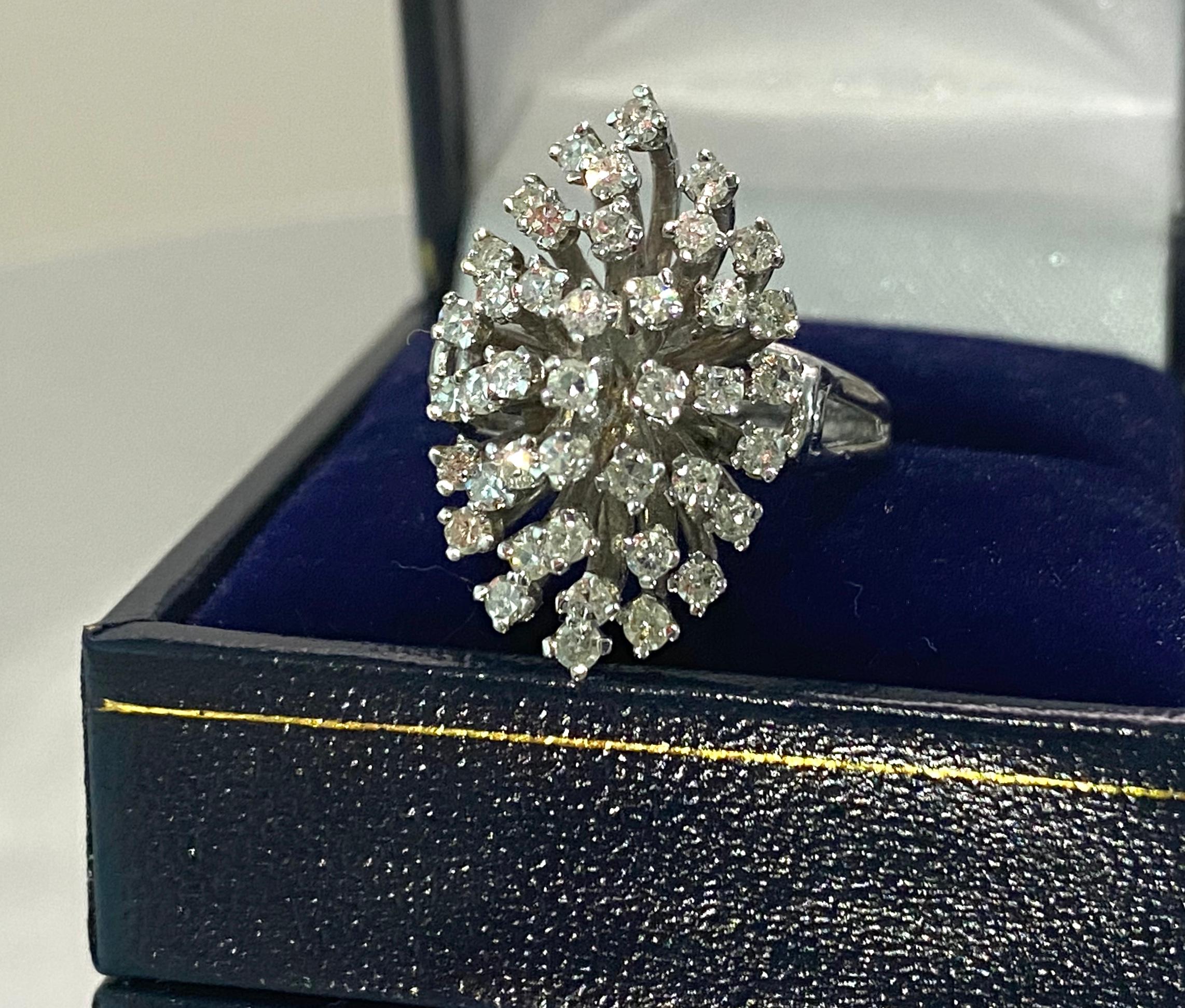 Metal: 14k white gold. 

Diamonds: 1.80 CWT. VS clarity and F color. Round cut diamonds. 

Gorgeous 100% natural earth mined Diamonds. 

Contemporary engagement ring. 

Ring size: US 6.25 
Free ring resizing available. 