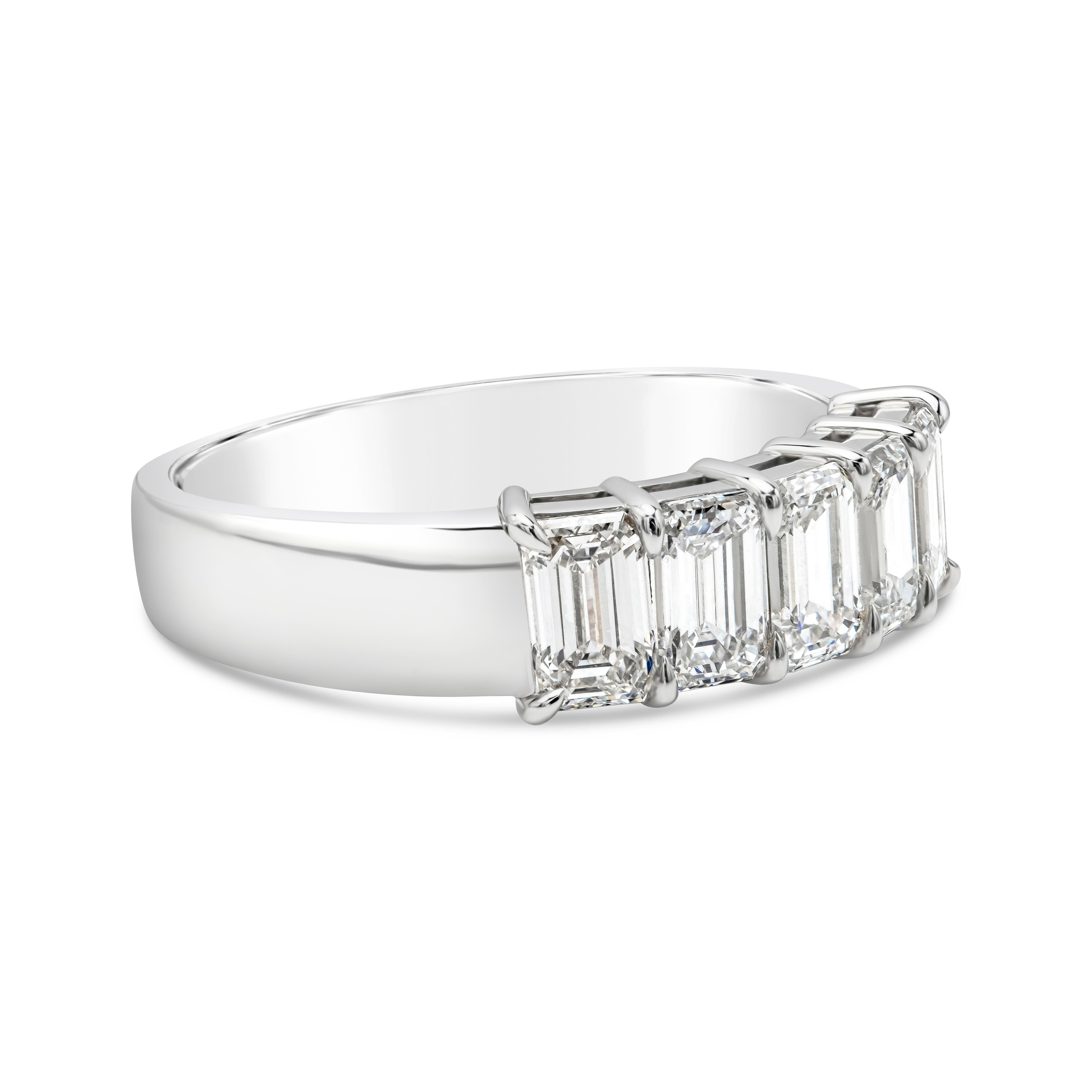 This gorgeous wedding band ring features 5 emerald cut diamonds weighing 1.80 carats total, D-E Color and VS in clarity. Set in a timeless shared prong setting and Finely made in Platinum, Size 6.75 US resizable upon request and 5.86mm in