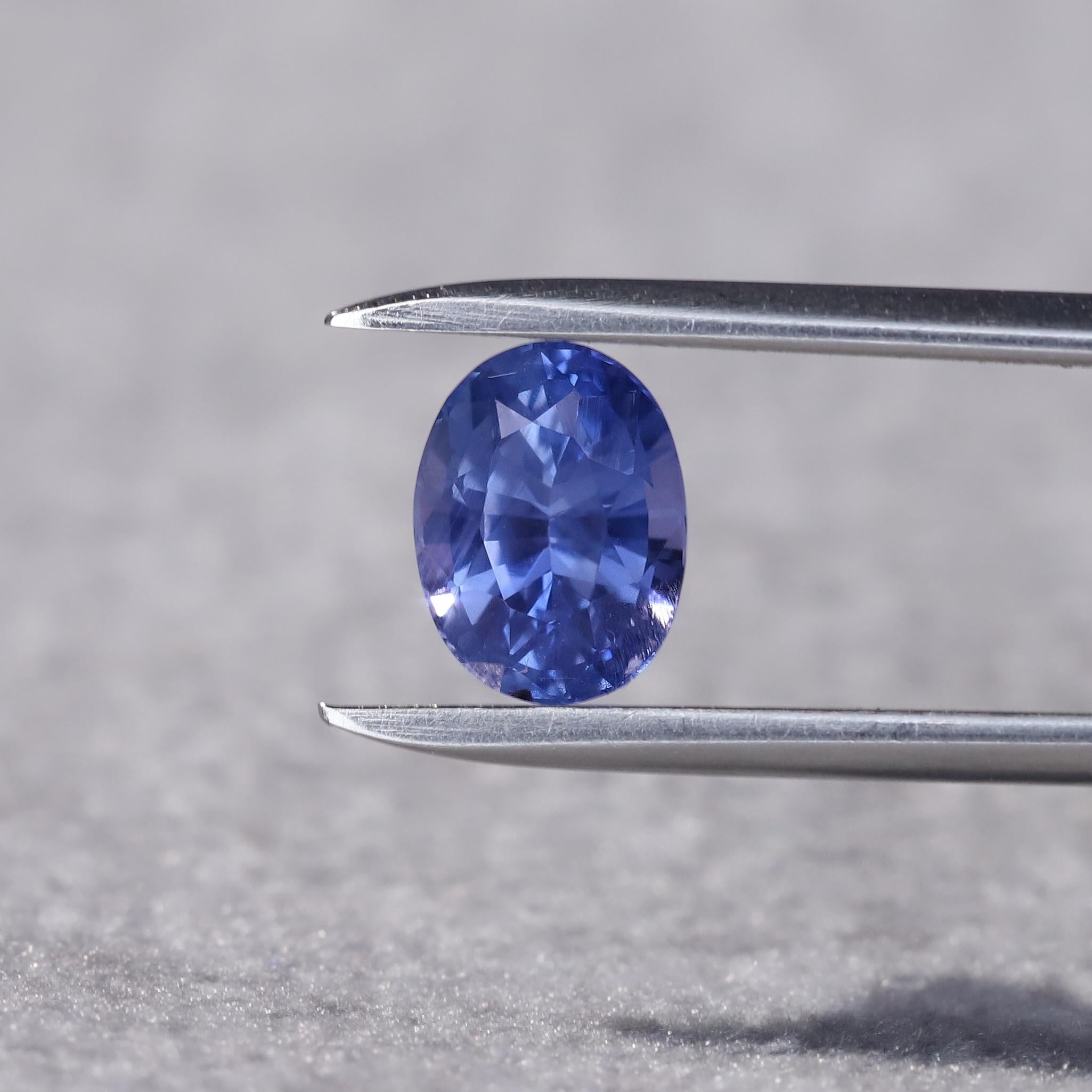 Luscious hues on this natural unheated Ceylon sapphire and its crisp cut facets come alive in sunlight, illuminating the gem with a radiant and luminous blue-violet glow - a highly desirable feature in an unheated blue sapphire.

Natural unheated