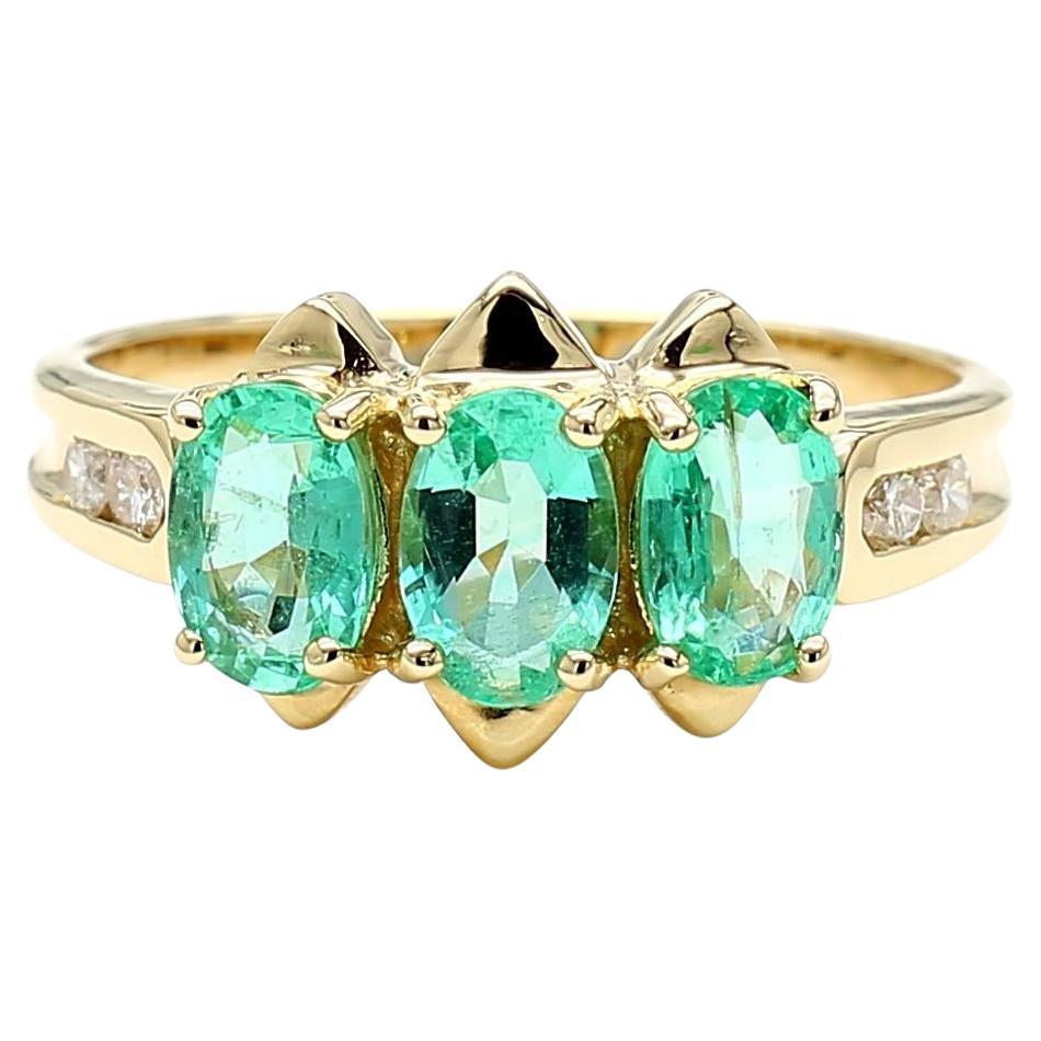 1.80 Carat Oval Emerald 3 Stone Ring in 14K Gold For Sale