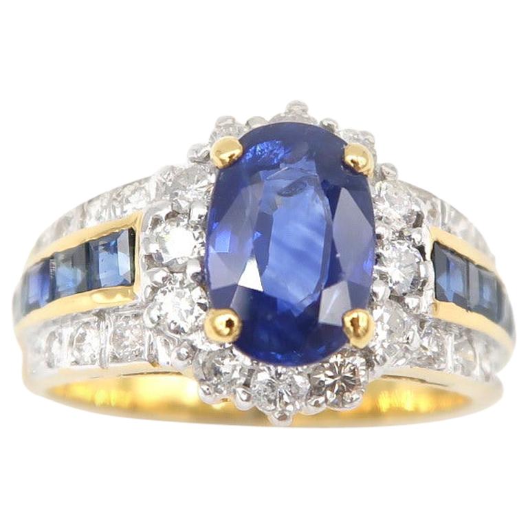 1.80 Carat Oval Sapphire Diamond Halo 18k Ring Lined Princess-Cut Sapphire Band For Sale