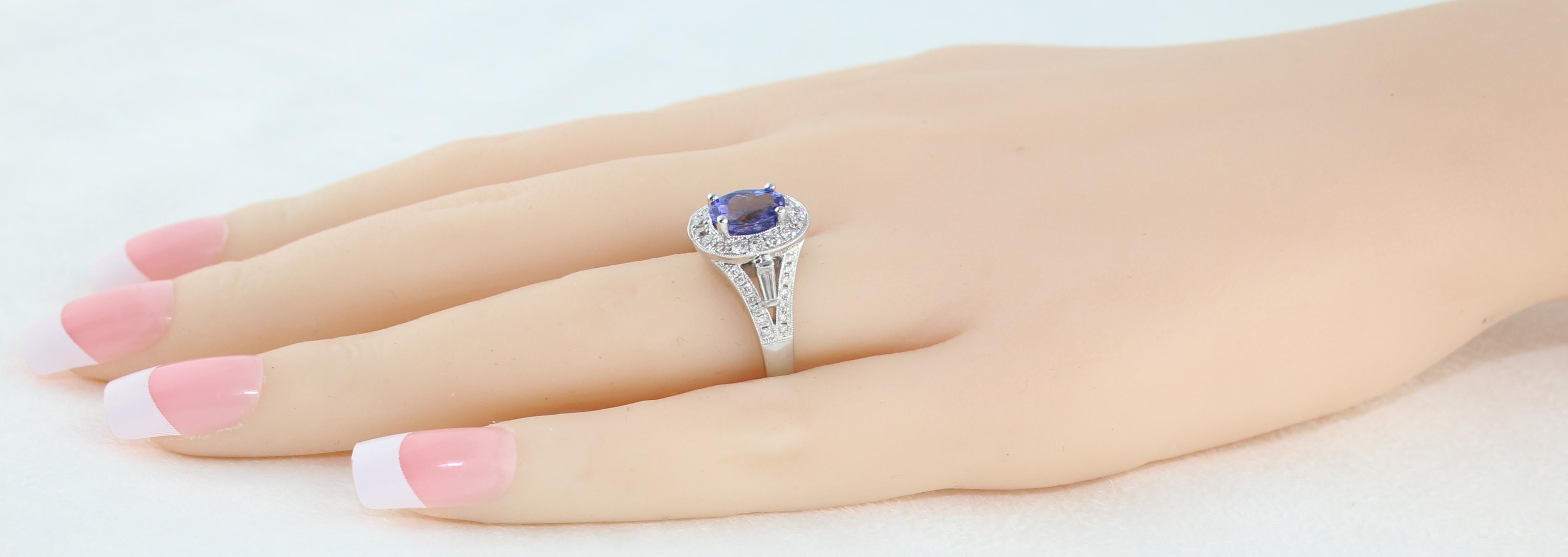 Women's 1.80 Carat Oval Tanzanite Diamond Halo Gold Ring For Sale
