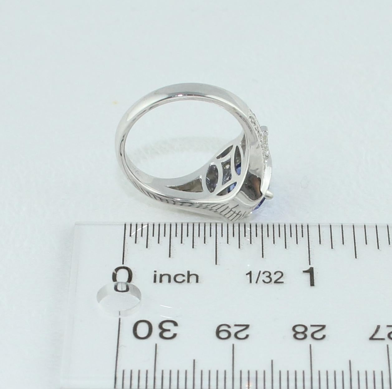 1.80 Carat Oval Tanzanite Diamond Halo Gold Ring For Sale 2