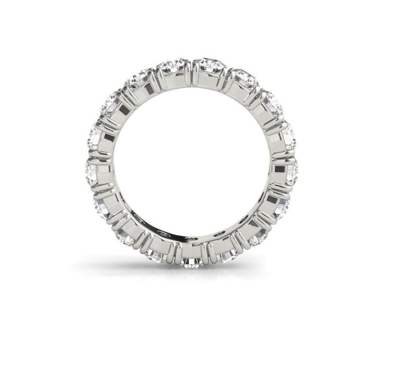 For sale is a  ladies diamond eternity wedding band. This wedding band features 18 Round Brilliant cut diamonds with a total diamond carat weight of 1.80CT With  E-F Color and  VS2-SI1 Clarity. The band is mounted in 14KT White Gold, Current Ring