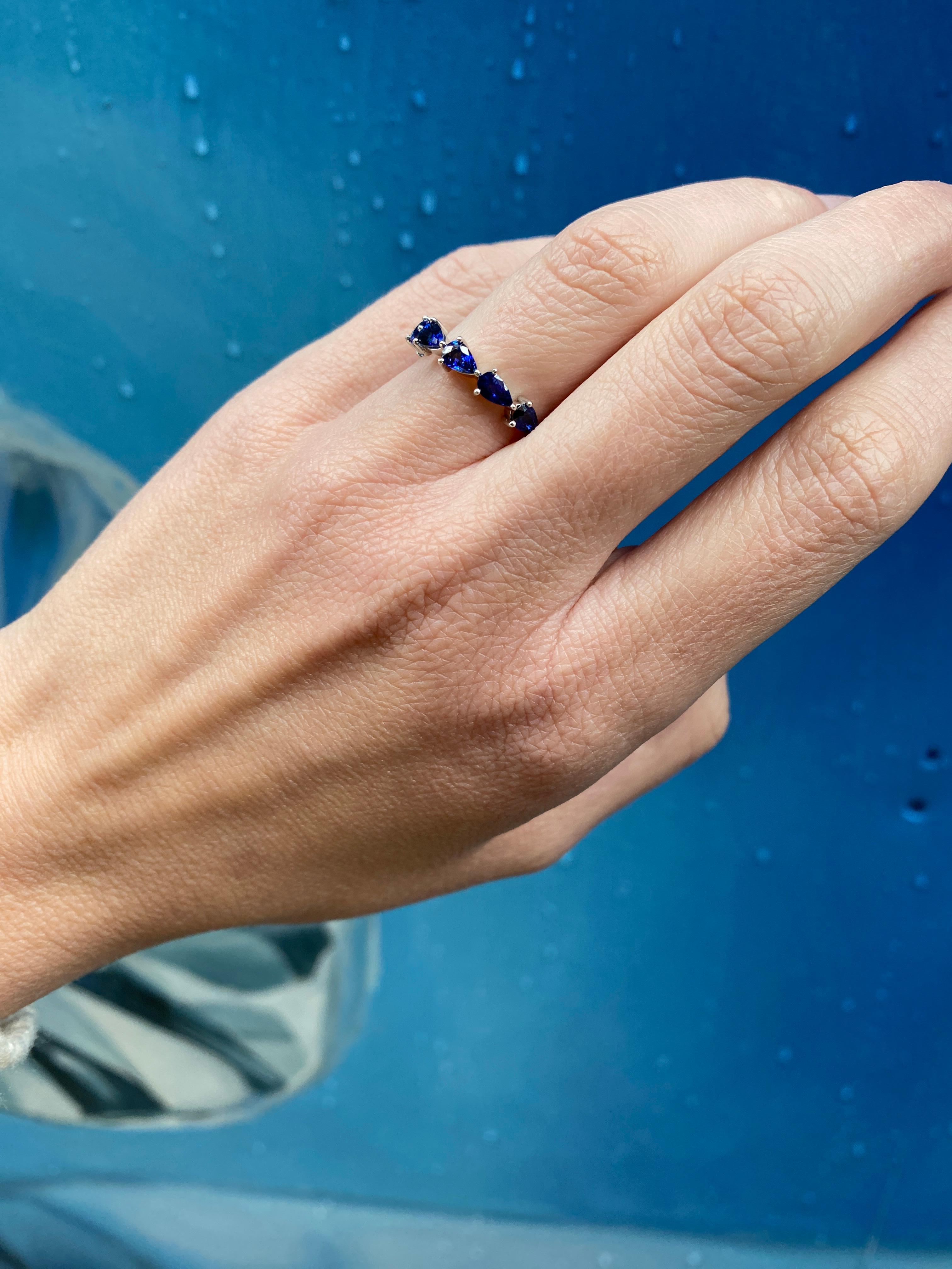 Modern 1.80 Carat Total Weight Natural Blue Sapphire Chasing Pear Band  For Sale