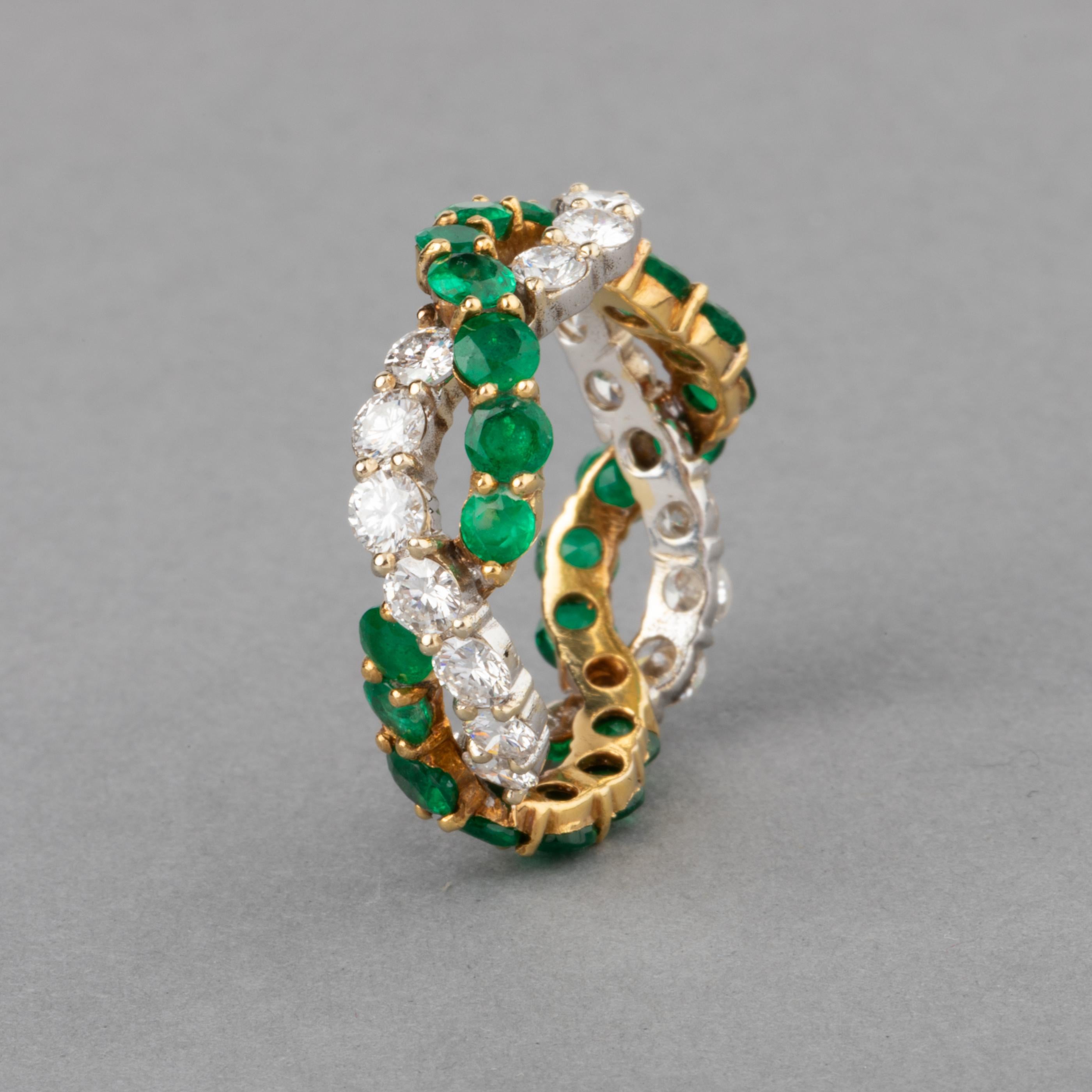 1.80 Carats Diamonds and 2.20 Carats Emeralds French Ring

Very lovely ring, made in yellow and white gold 18k. 
Made in France circa 1970.
The diamonds are good quality, brilliant cut. 1.80 carats estimate.
The emeralds are good quality also.
The