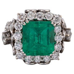 1.80 Carats Diamonds and 6.14 Carats Emerald French Vintage Ring