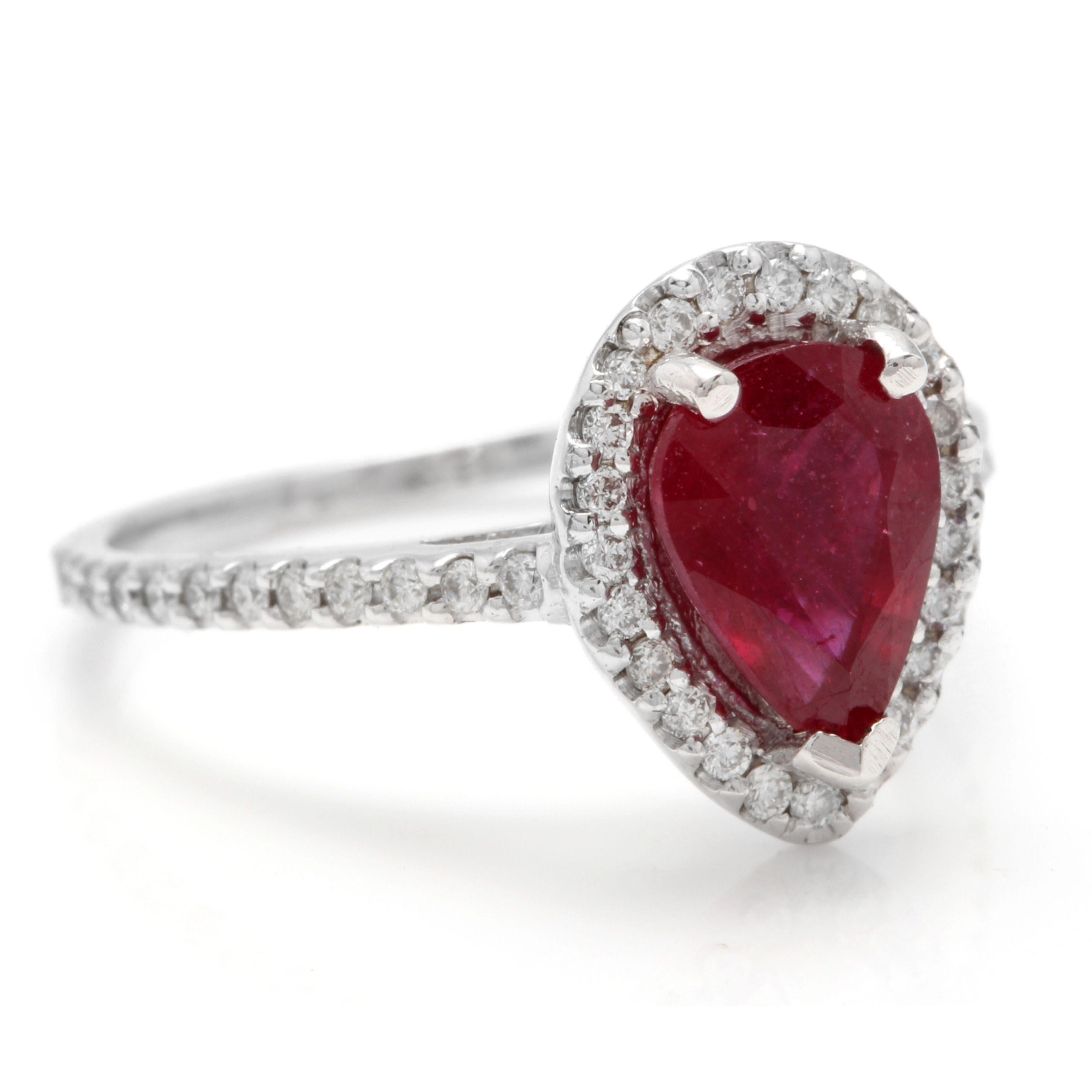 1.80 Carats Impressive Red Ruby and Natural Diamond 14K White Gold Ring

Total Red Ruby Weight is: Approx. 1.50 Carats

Ruby Treatment: Lead Glass Filling

Ruby Measures: Approx. 8.00 x 6.00mm

Natural Round Diamonds Weight: Approx. 0.30 Carats