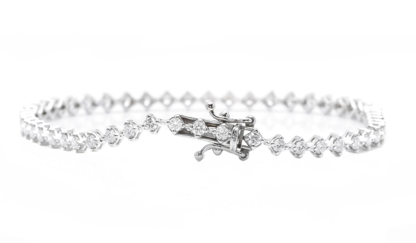 1.80 Carats Stunning Natural Diamond 14K Solid White Gold Bracelet 

Suggested Replacement Value: Approx. $5,500.00

STAMPED: 14K

Total Natural Round Diamonds Weight: Approx. 1.80 Carats (color G-H / Clarity SI1-SI2)

Bangle Wrist Size is:  7