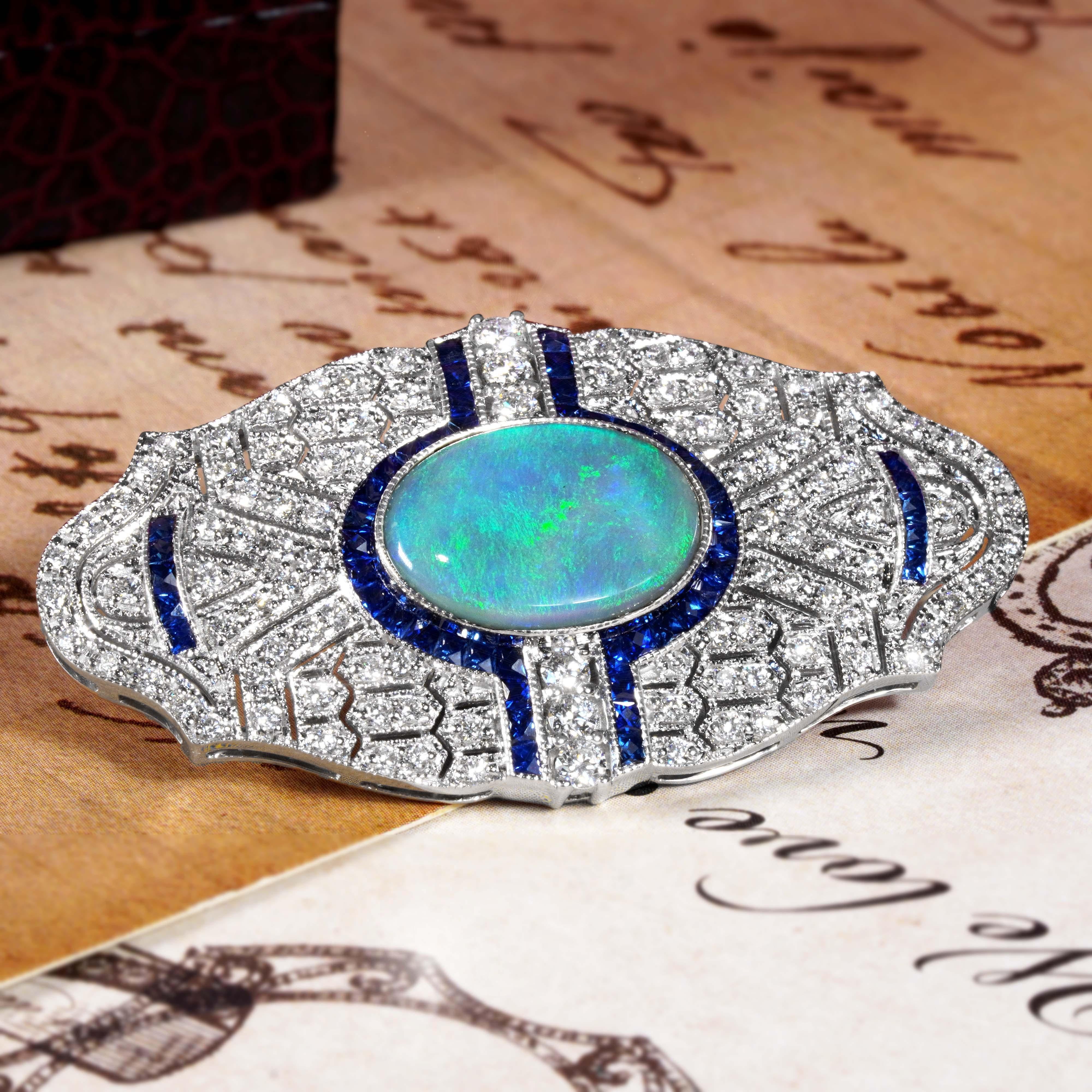 This stunning brooch captures the spirit of the Art Deco era with its clean lines, geometric balance, and luxurious gemstone combination. At the center, a glowing 1.80 carat black opal radiates, exhibiting a stunning range of colors. Surrounding the