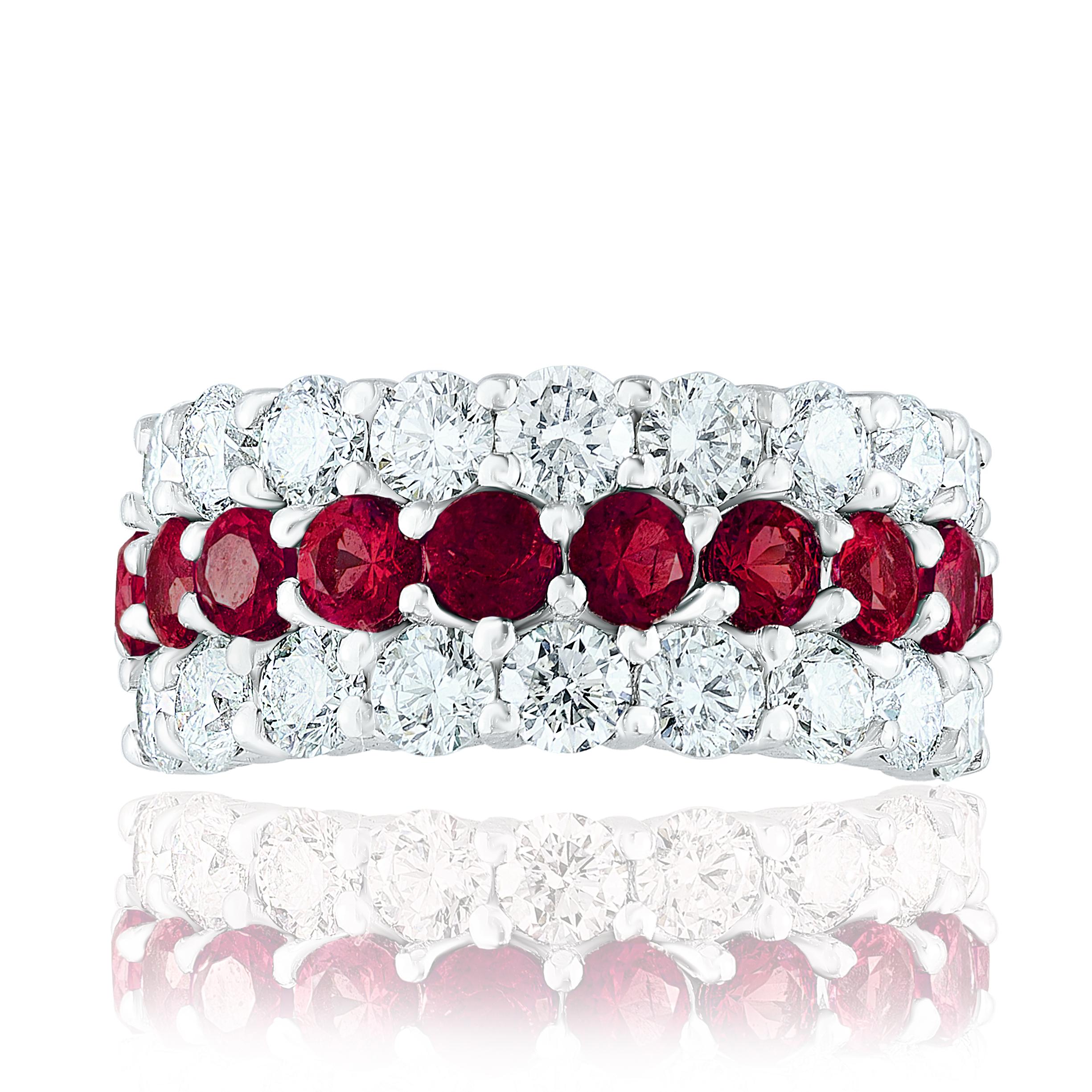 A unique and fashionable ring showcasing two rows of round-shape 18 diamonds and one row of 10 vibrant rubies in the middle, set in a band design. Rubies weigh 1.80 carats and Diamonds weigh 2.70 carats total. A brilliant and masterfully-made