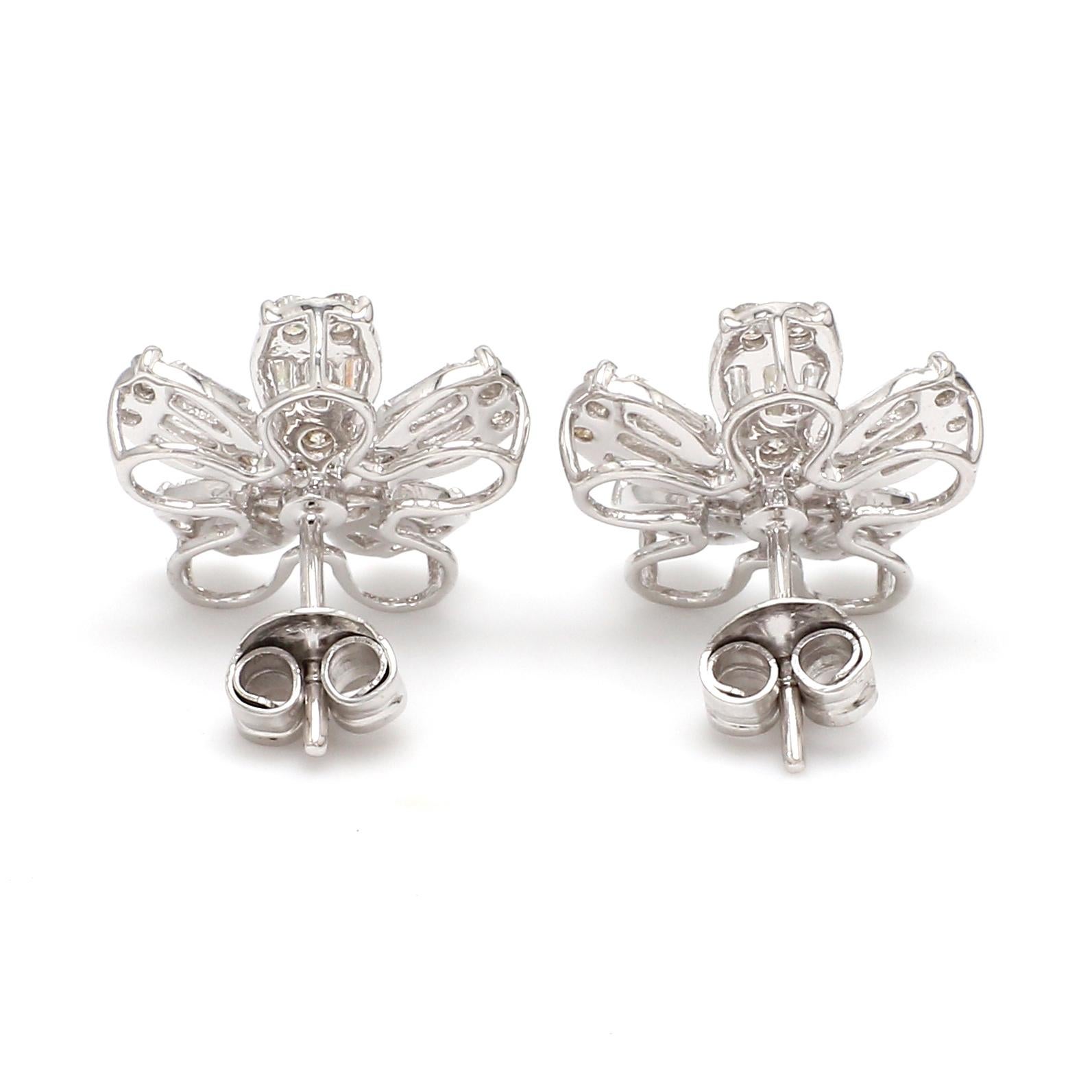Modern 1.80 Ct SI Clarity HI Color Baguette Diamond Flower Stud Earrings 14k White Gold For Sale