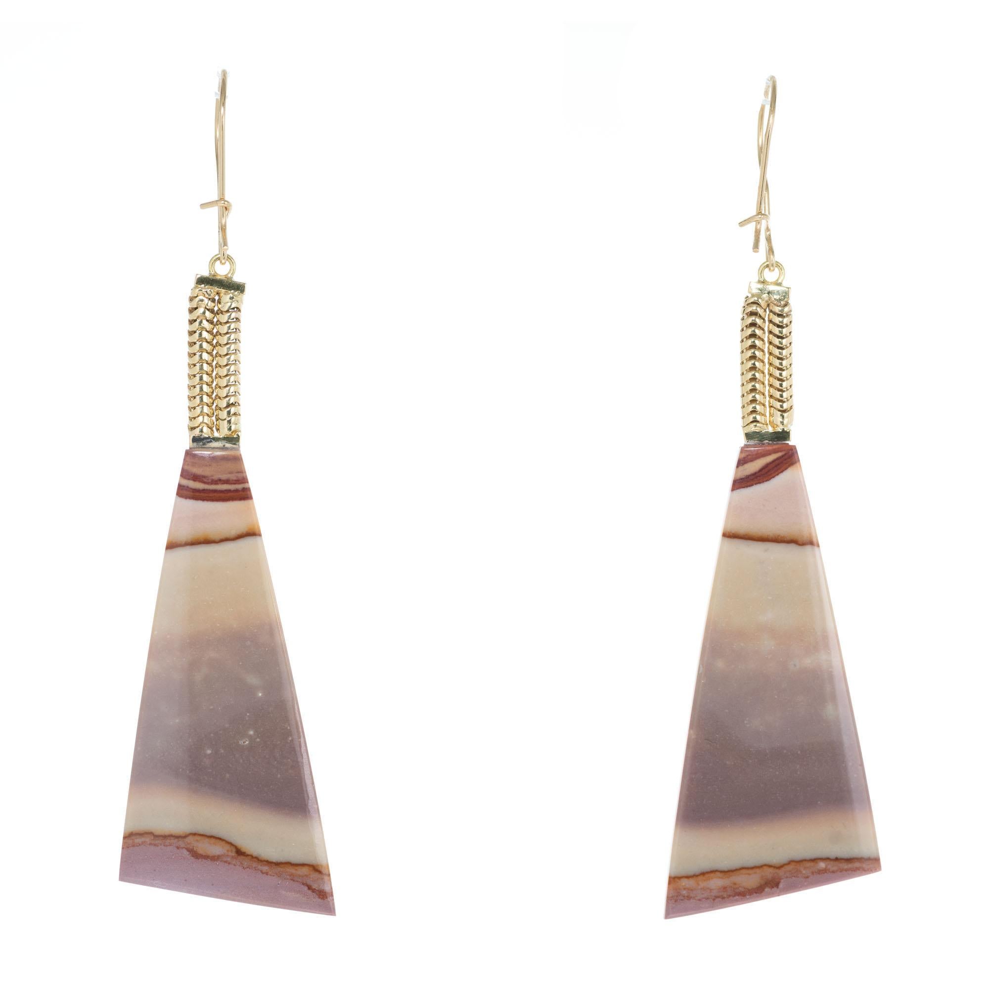 1940's Agate dangle earrings with natural banded Agate with double snake chain tops on a simple wire. 

2 natural untreated banded color Agate, approx. total weight 18.00cts, 39 x 19 x 4.26mm 
14k yellow gold 
Tested: 14k 
Stamped: Not
11.6 grams