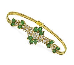 Set aus Halskette, Armband und Ring aus 18-karätigem Gold mit einem Smaragd (18,00 Karat) und einem Diamanten (4,50 Karat)