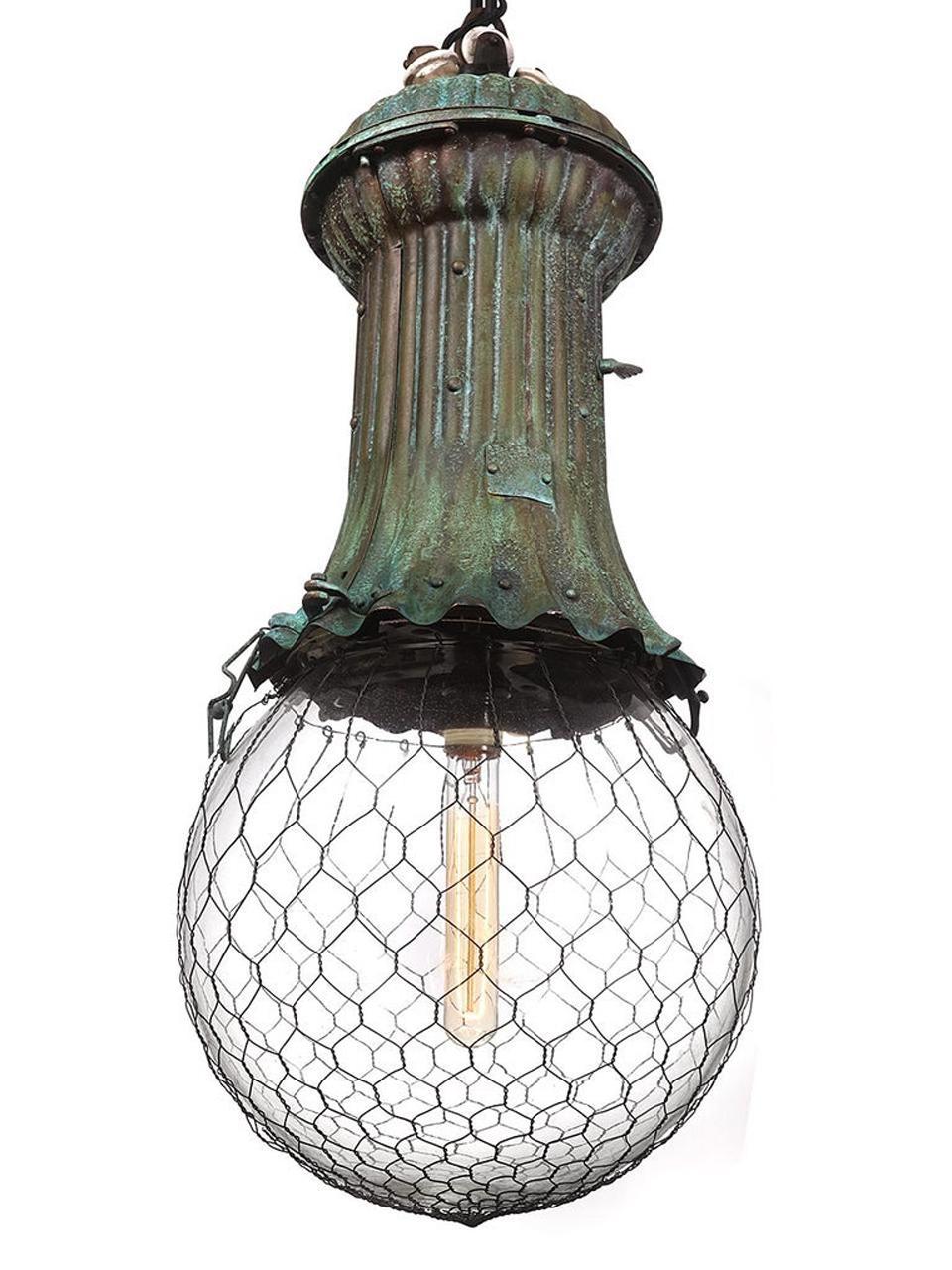 It's nice to hang a rare lamp but it still needs to look great as well. I think this was one of the most striking Industrial lamps made. It is a street light but it has a sense of style rarely found in municipal lighting. These 1800s lamps were in