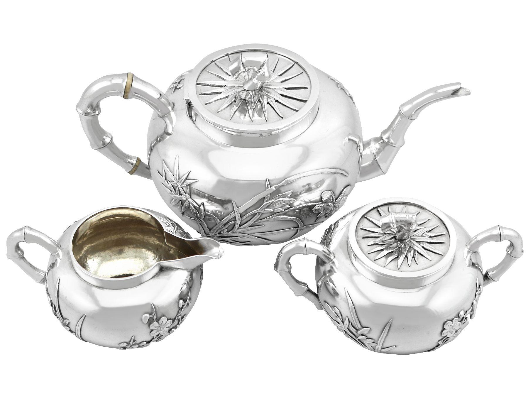 An exceptional, fine and impressive antique Chinese export silver three piece tea service; an addition to our diverse silver teaware collection

This exceptional antique tea set/service, in Chinese Export Silver consists of a teapot, cream jug and