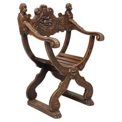 Fauteuil ancien curule des années 1800, néo-Renaissance, sculpté, incurvé, fauteuil