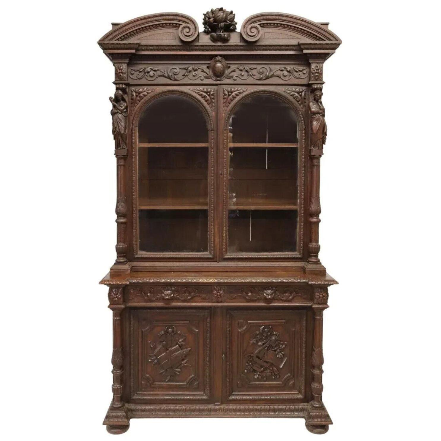 Absolutely Gorgeous Antique Bookcase, French, Figural, Carved Oak, Library, Stepback with Glazed Doors, 1800s, 19th century!!

French oak stepback bookcase, late 19th Century 1800's, molded cornice, frieze with monogrammed cartouche framed by