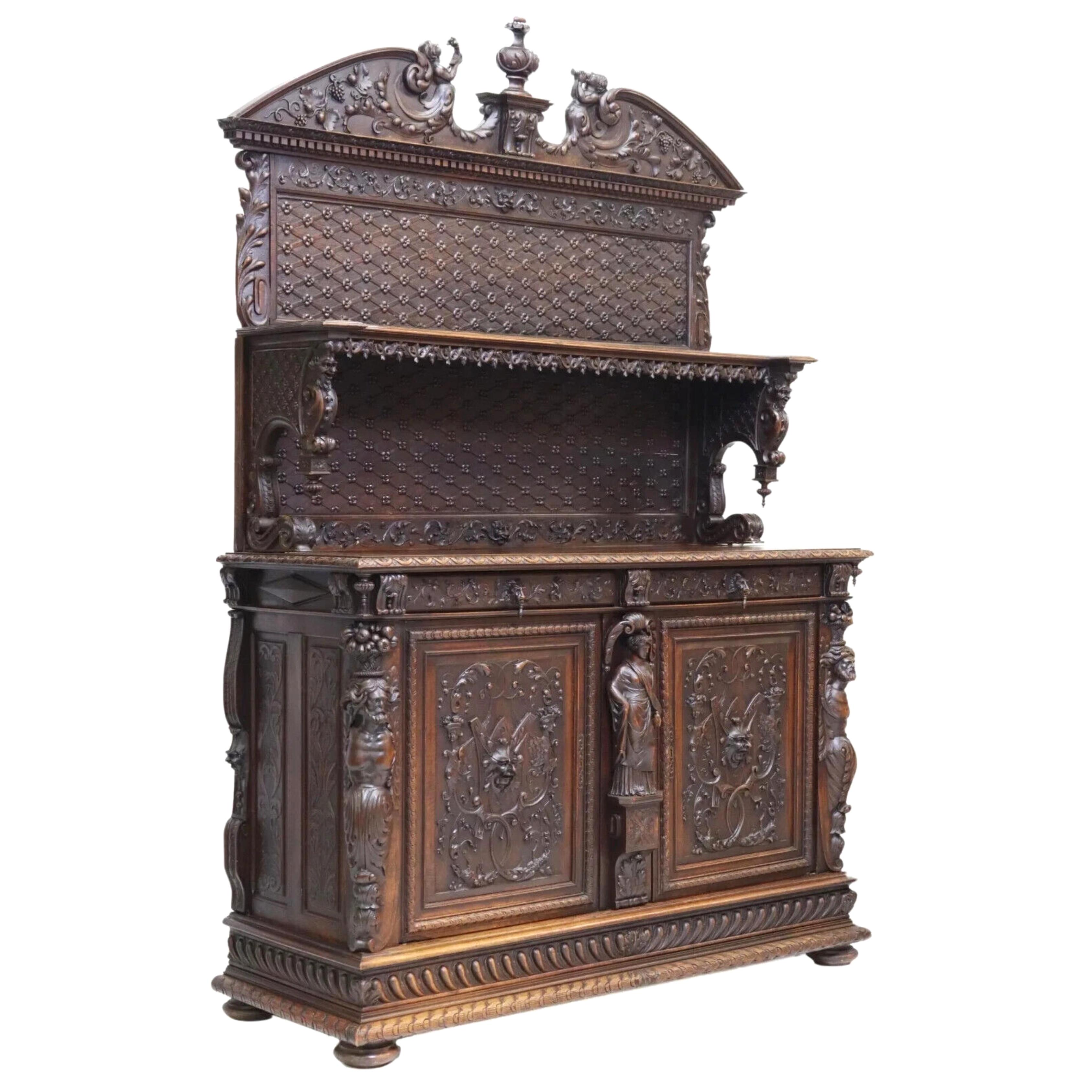 
Gorgeous Antique Sideboard, French Renaissance Revival,  Carved, 19th Century,  1800s!  

This antique sideboard is a stunning piece that will elevate any space with its intricate carvings and dark wood tones. With a length of 64 inches, a height