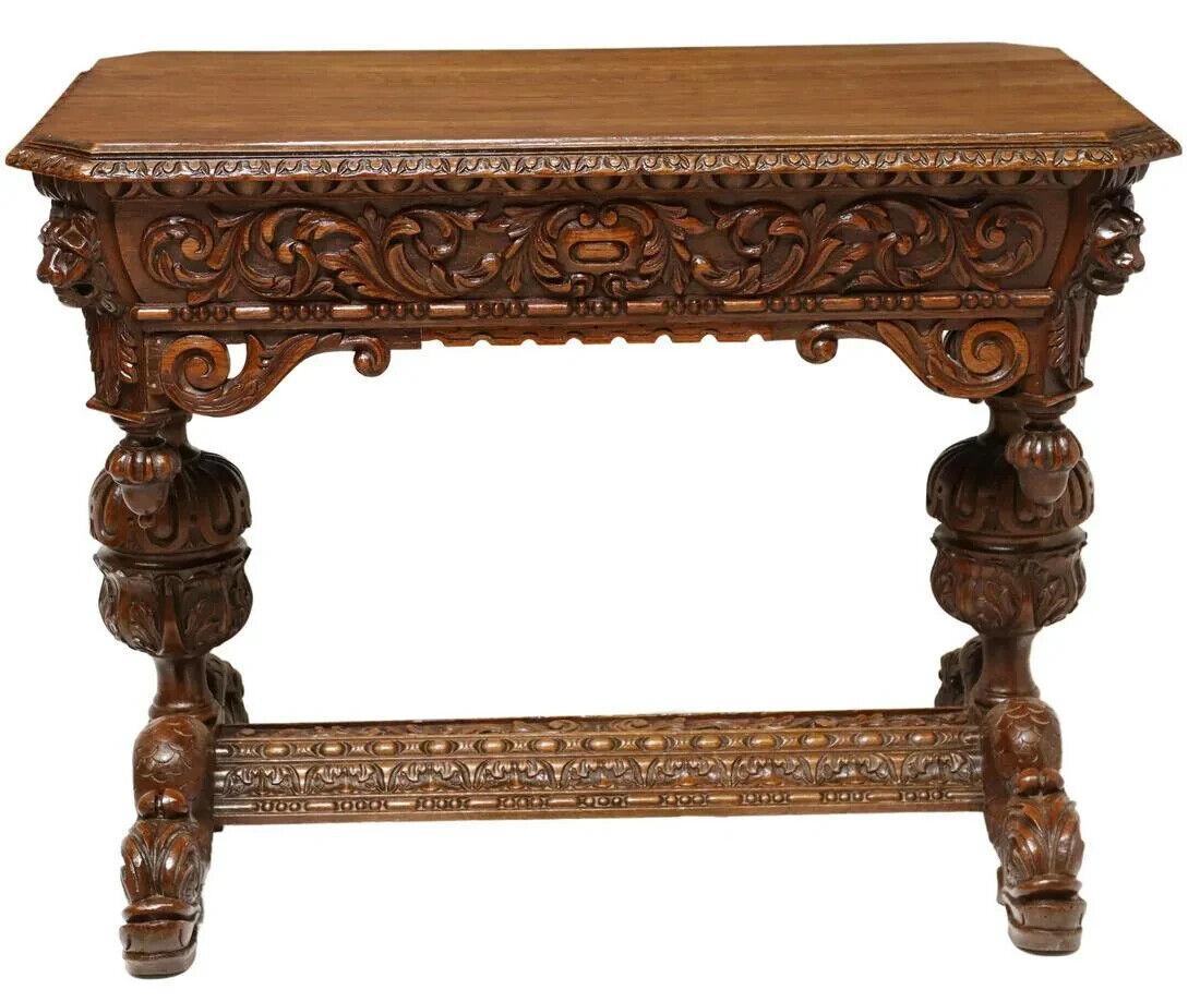 Beautiful Antique Table, Writing, Highly Carved, French Renaissance Revival, 19th C,  1800s!!

French Renaissance Revival writing table, late 19th c., profusely foliate and mask carved with pendant finials, the rectangular canted corner carved edge
