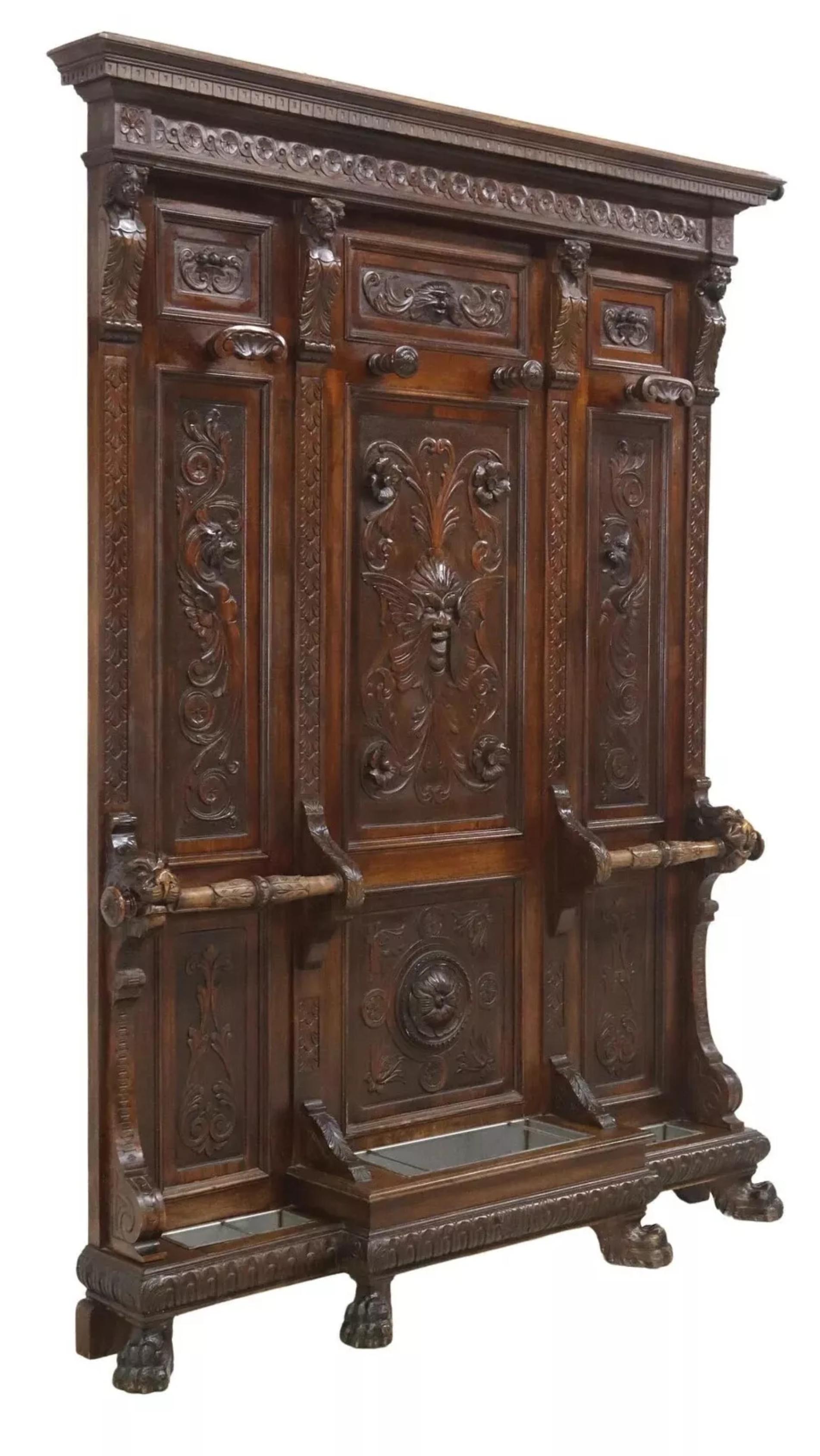 Gorgeous Antique Hall Tree, Italian Renaissance Revival, Carved, Walnut, Foliate, Figural Supports, 19th Century, 1800s!!

This antique hall tree is a stunning piece of Italian Renaissance Revival artistry. Crafted from dark walnut, this rectangular