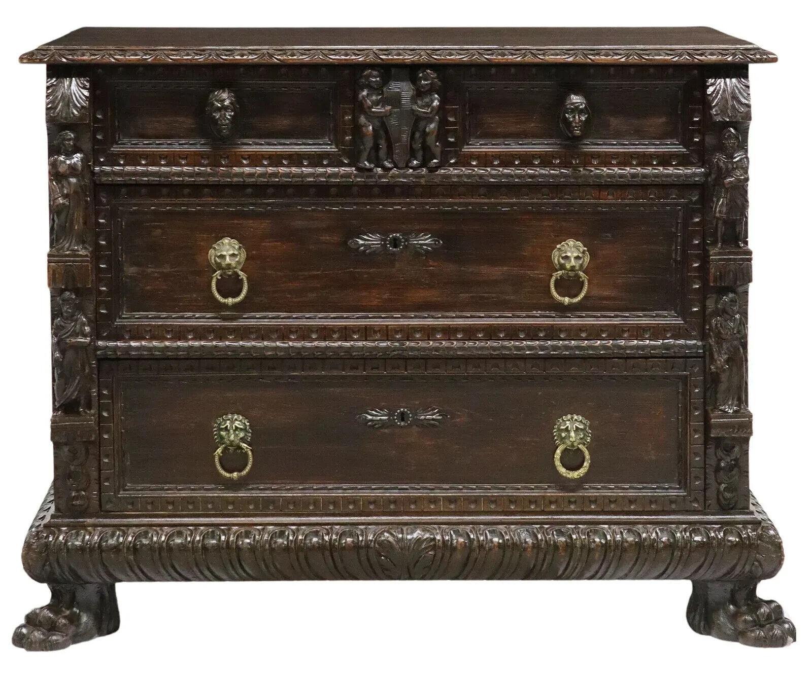Stunning 1800's Antique  Italian Renaissance Revival, Figural, Drawers. Carved Commode!!

Italian Renaissance Revival commode, 19th c., three drawers framed by carved figures, top drawer centered by putti supporting a shield, on lion's paw feet,