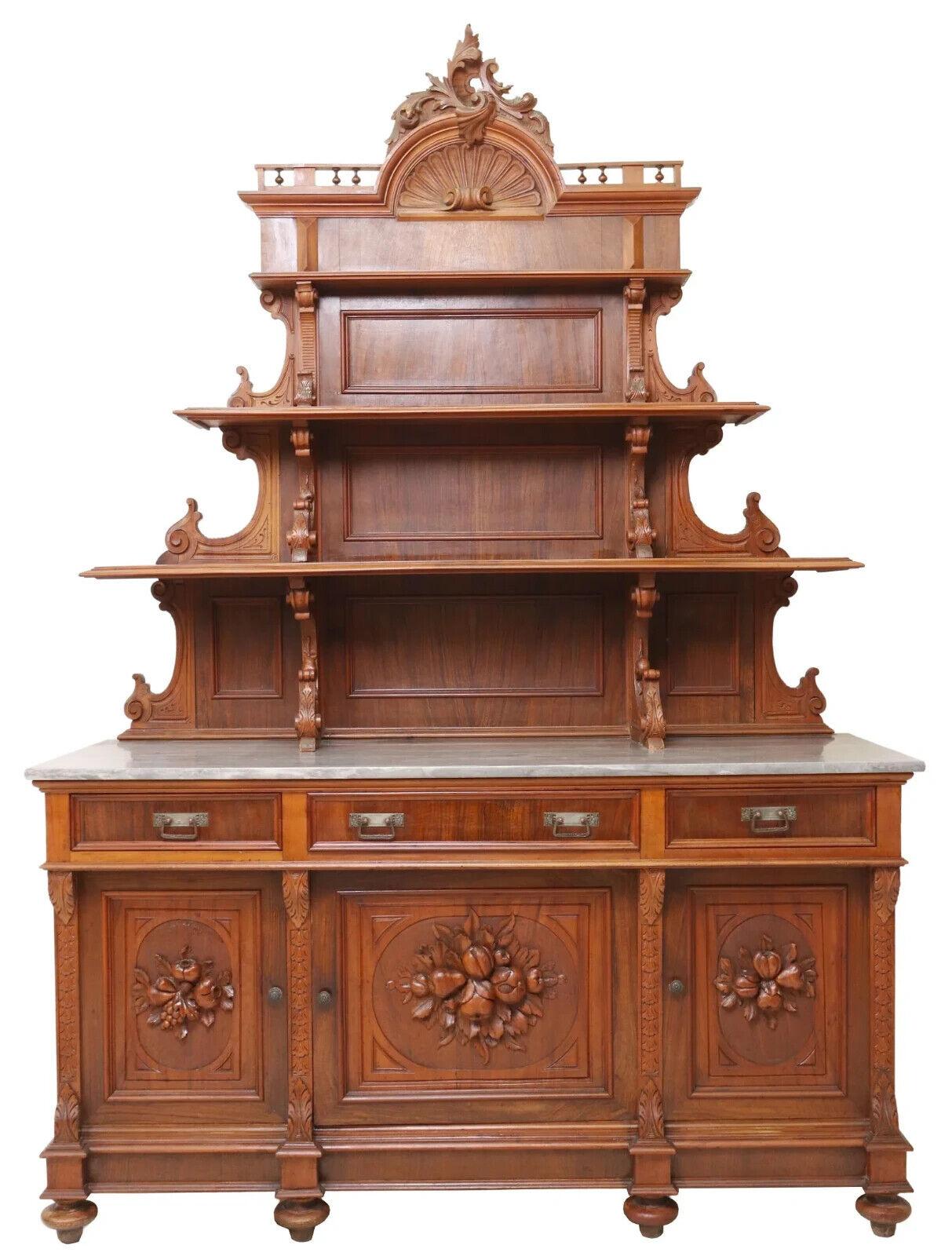 Stunning Antique Sideboard, Italian Marble-Top, Carved, Foliate, Display, 19th Century, 1800s!!

This lovely antique Italian sideboard was made during the 19th Century. This lovely cabinet is accented with foliate carving. The raised shelved back