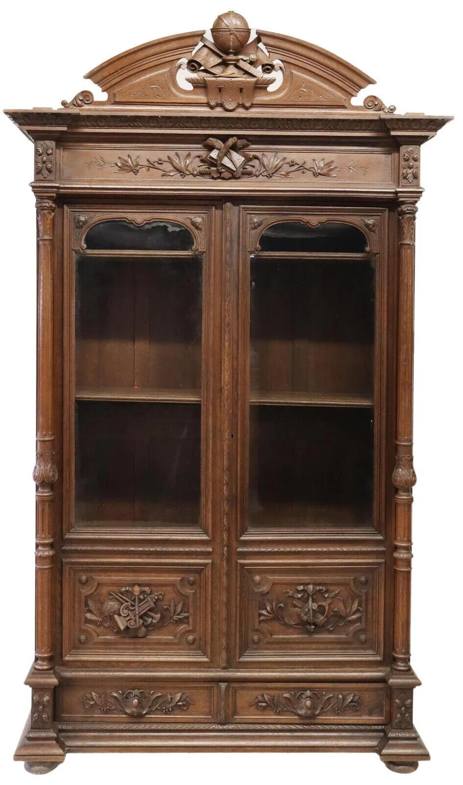 Exceptional Antique Bookcase , Italian Renaissance Revival, Foliates, Late 19th Century, 1800s, 19th Century!!

This exquisite antique bookcase features exceptional craftsmanship and stunning carved details. Made of solid oak in the French style, it