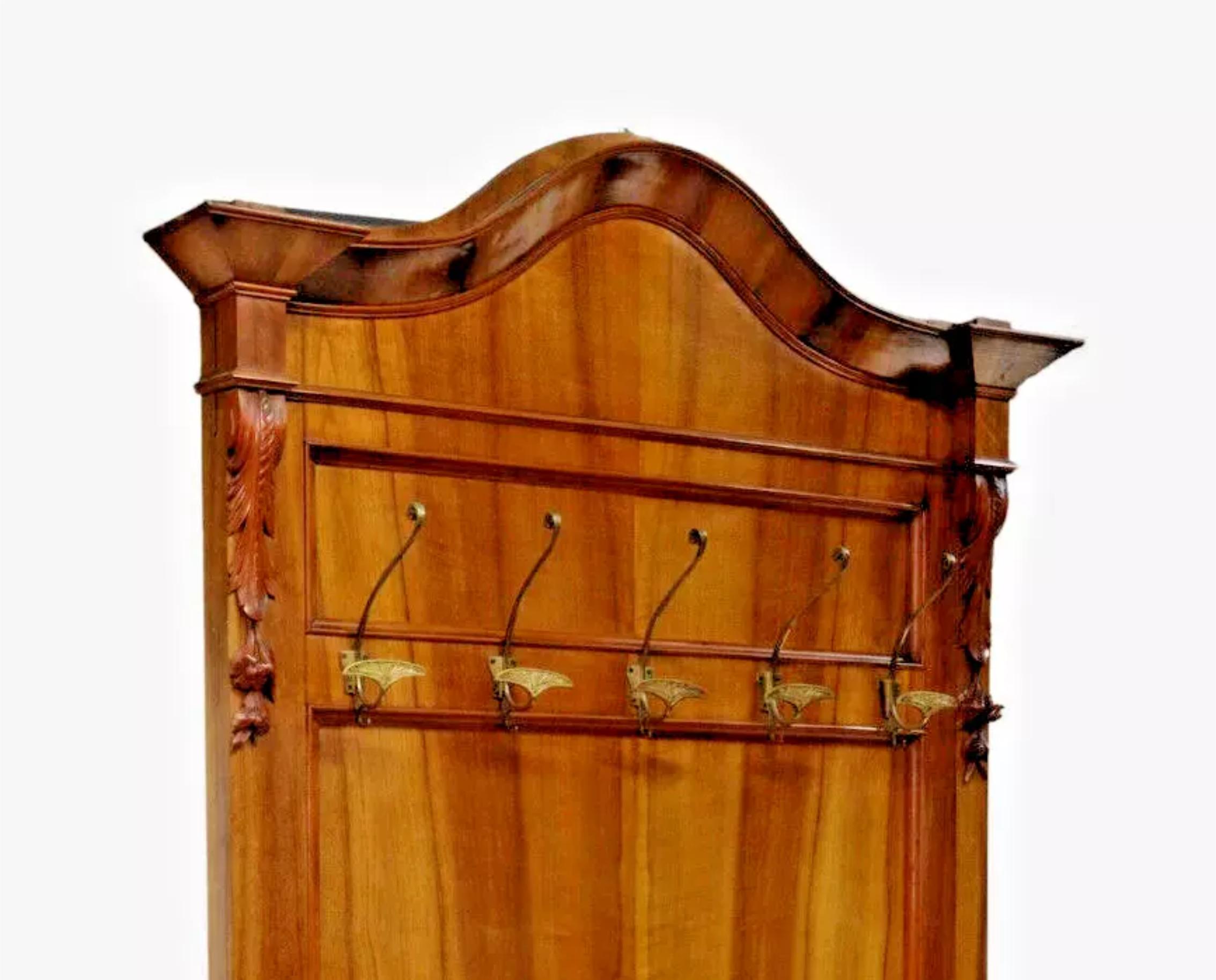 Gorgeous Antique Hall Tree, Louis Philippe Period, Walnut, Carved, Gilt Hooks,  1800s, 19th Century!!

This antique hall tree is a stunning piece of furniture that will add a touch of elegance to any room. Made of walnut wood, this tree features