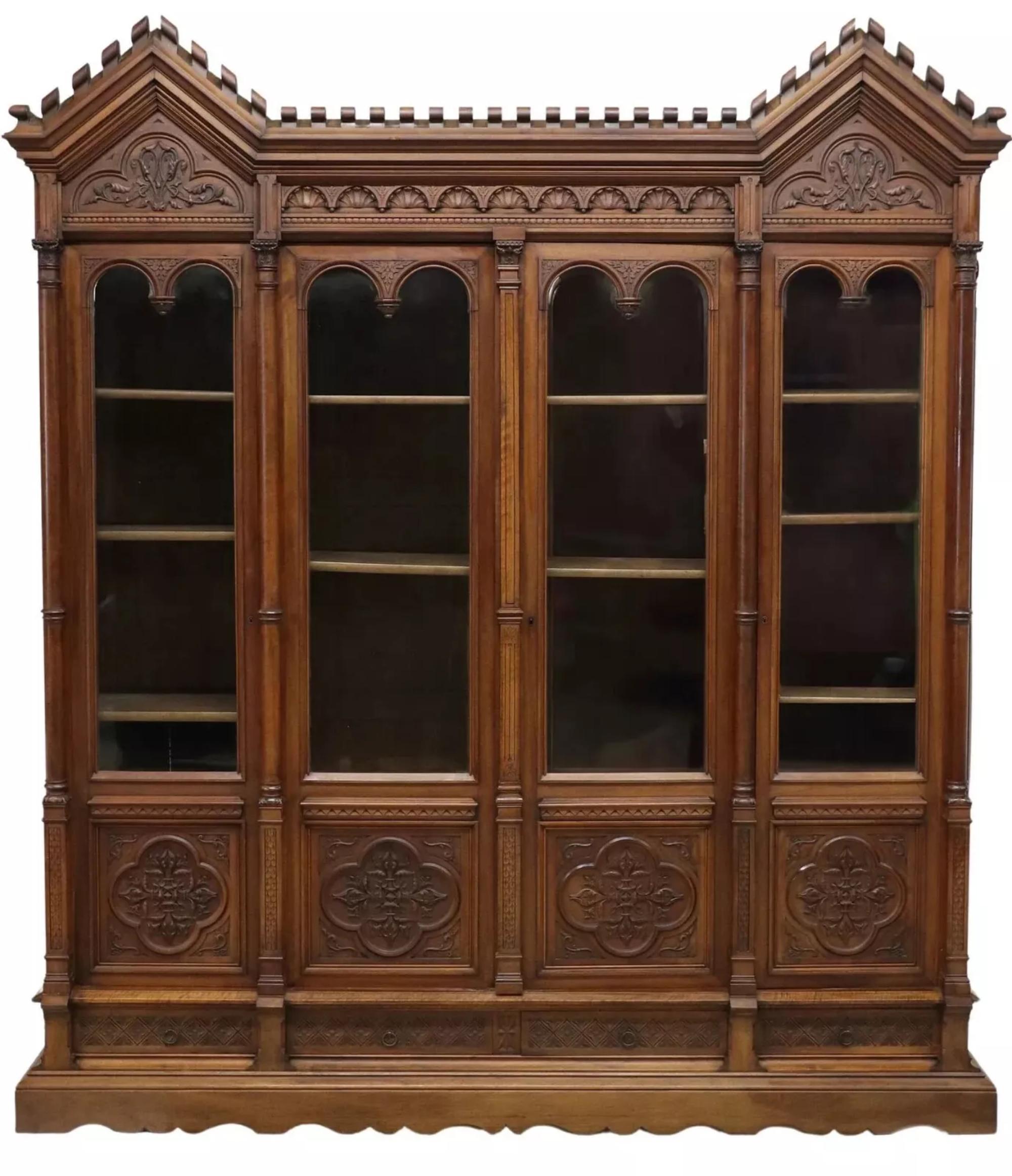 Gorgeous 1800s  Antique Monumental French, Gothic Revival, Display 7194.Carved Bookcase!

Antique Bookcase, Monumental French, Gothic Revival, Carved , 19th C 1800s!!

This antique bookcase is a true monument to French Gothic Revival style. Crafted