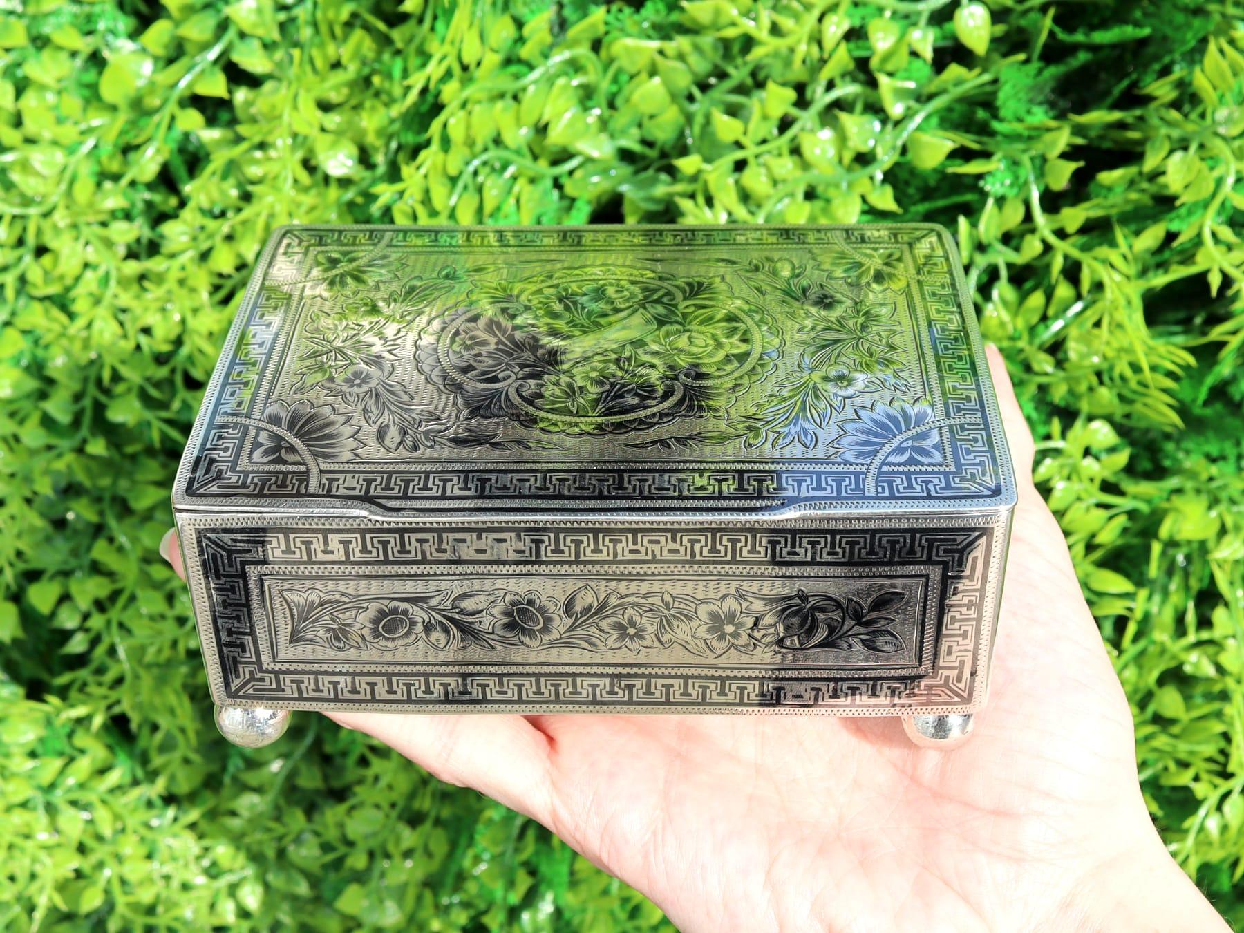 An exceptional, fine and impressive antique silver and niello enamel box; an addition to our diverse silverware collection

This exceptional antique Persian silver box has a rectangular form, supported with four plain ball feet.

The body of this