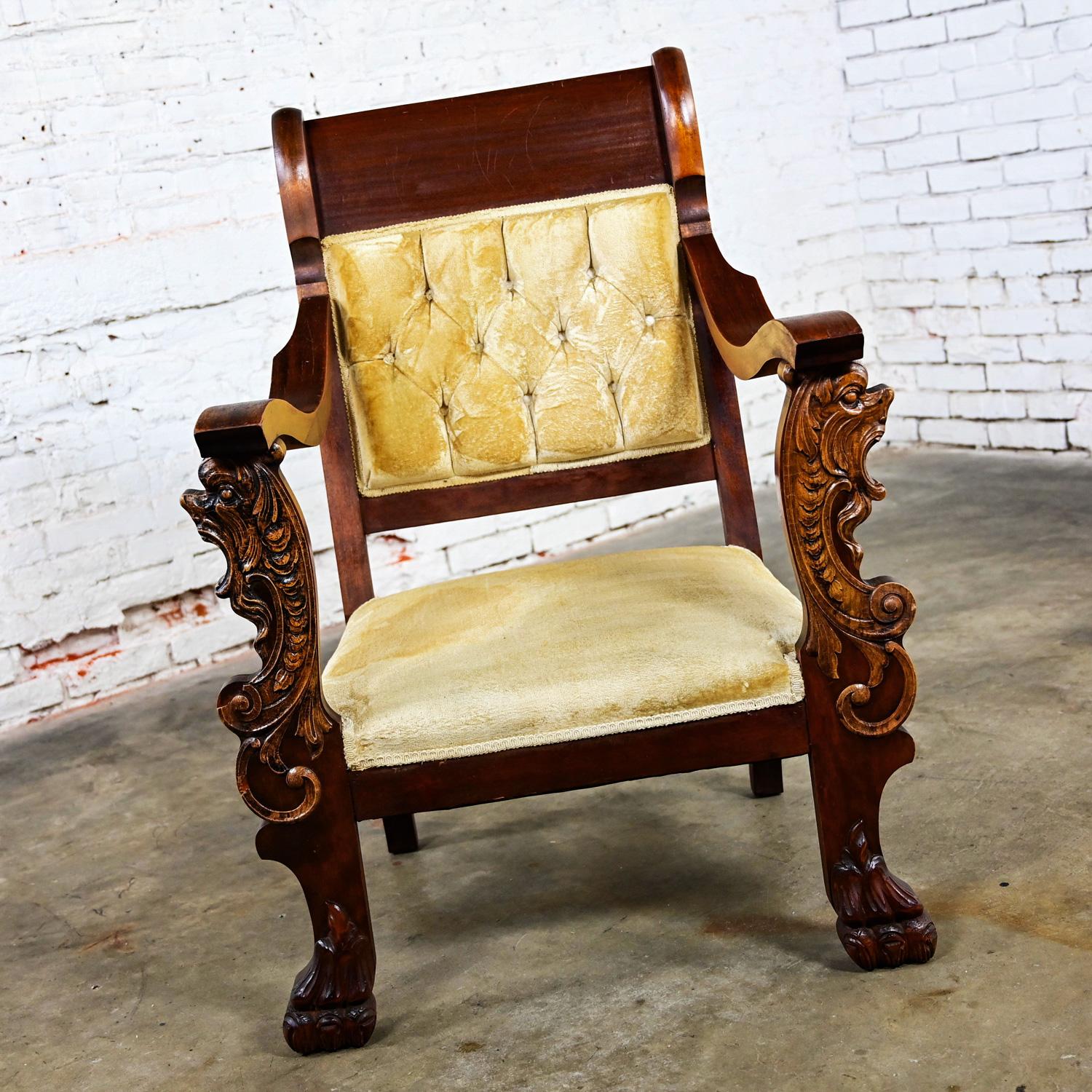 Fabulous Antique Victorian mahogany armchair with hand carved figural lion heads & claw feet. Vintage golden yellow velvet upholstery with gimp trim, sprung with Jute webbing, & coil springs. Beautiful condition, keeping in mind that this is vintage