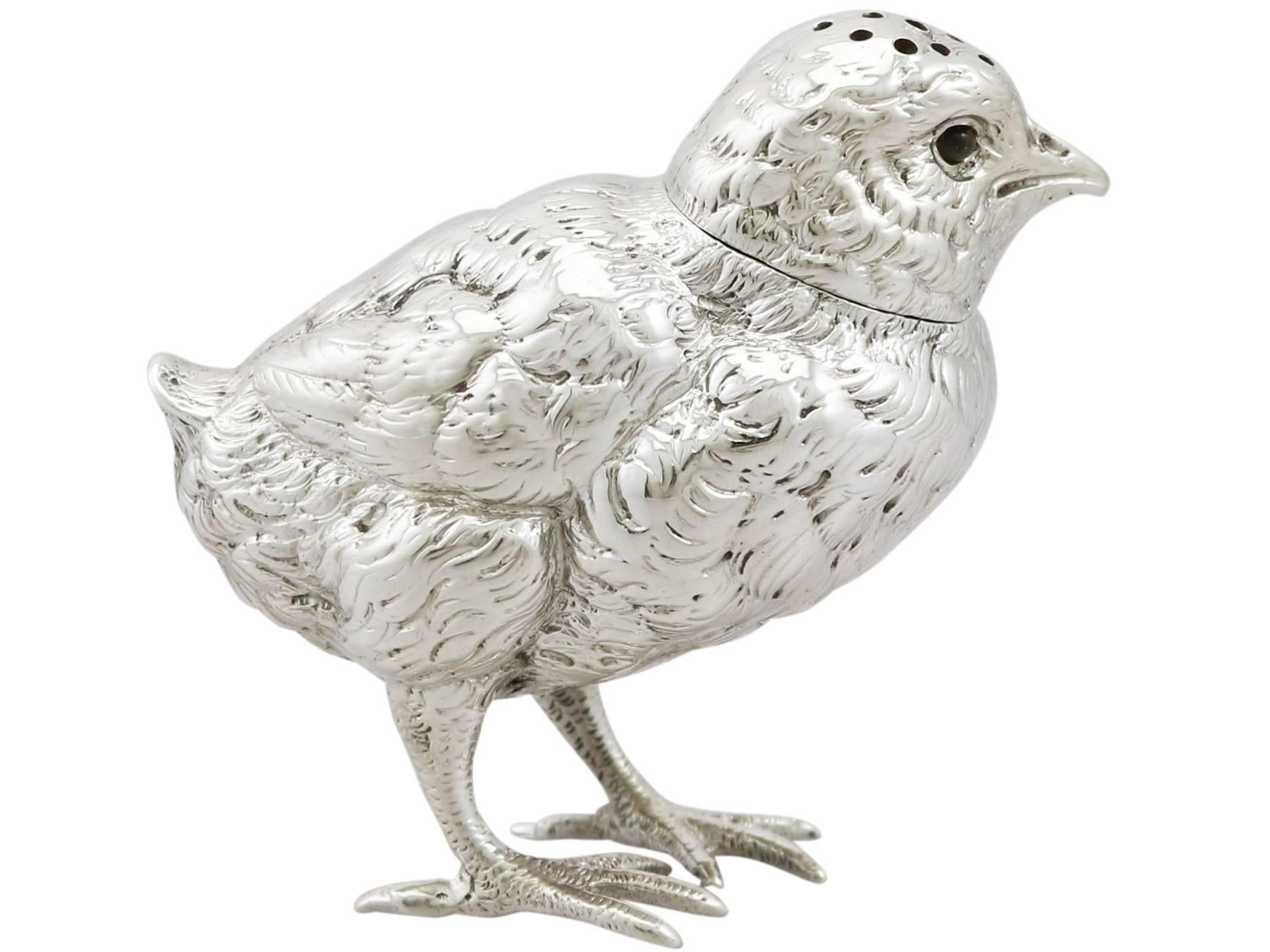 An exceptional, fine and impressive, large antique Victorian English sterling silver pepperette modeled in the form of a bird / chick; an addition to our animal related silverware collection

This exceptional antique Victorian cast sterling silver