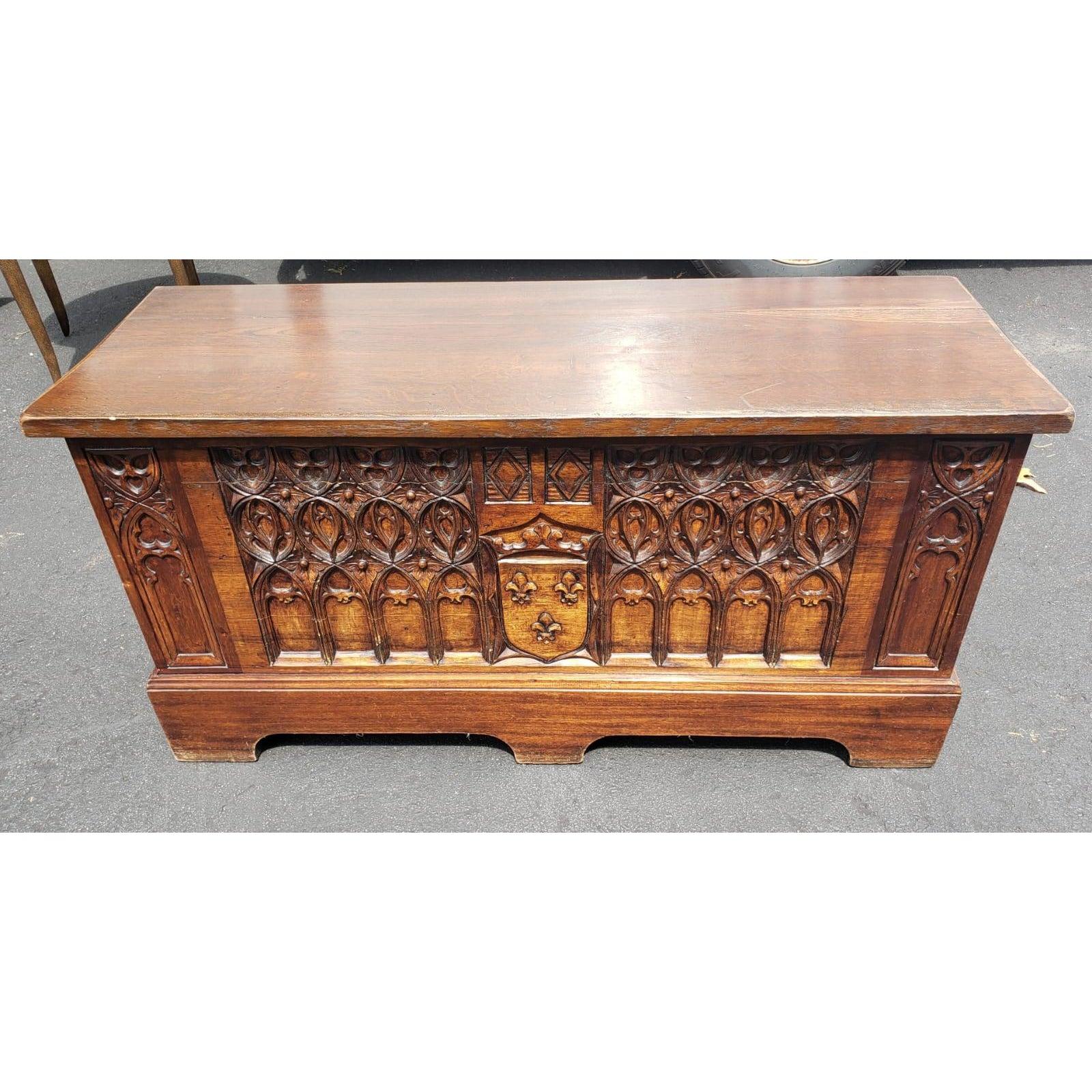 Large 48 inches one of a kind antique carved wood chest / trunk / cedar chest. Features intricate hand carved details and a unique style and character. Solid carved wood frame and with great patina and finish. Spacious enough to hold many items and