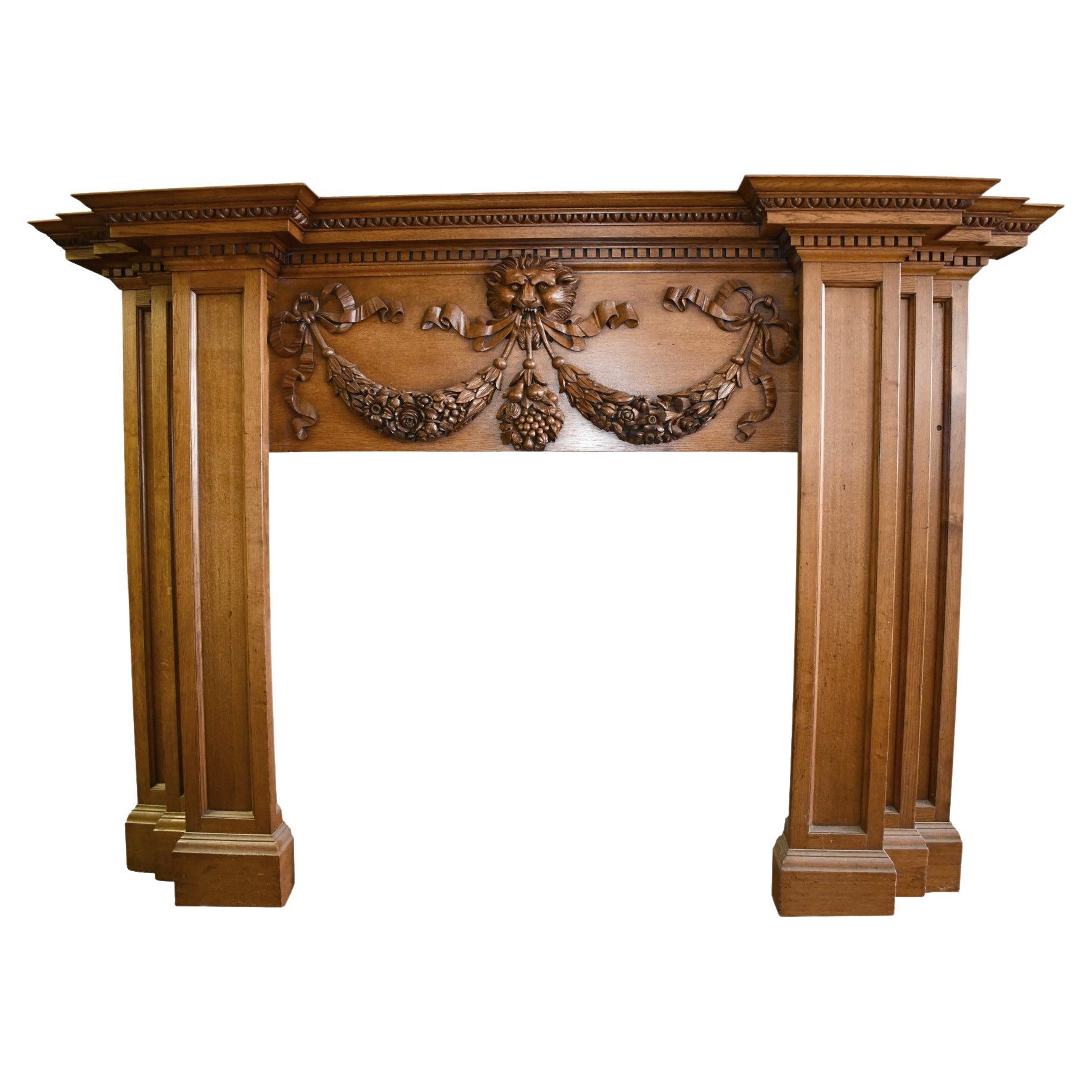 1800s English Regency Style Carved Oak Tall Mantel with Lion, Ribbon and Swags For Sale
