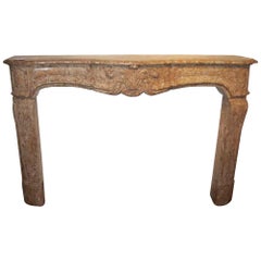 1800s French Country Caramel Colored Stone Mantel; Hand Carved
