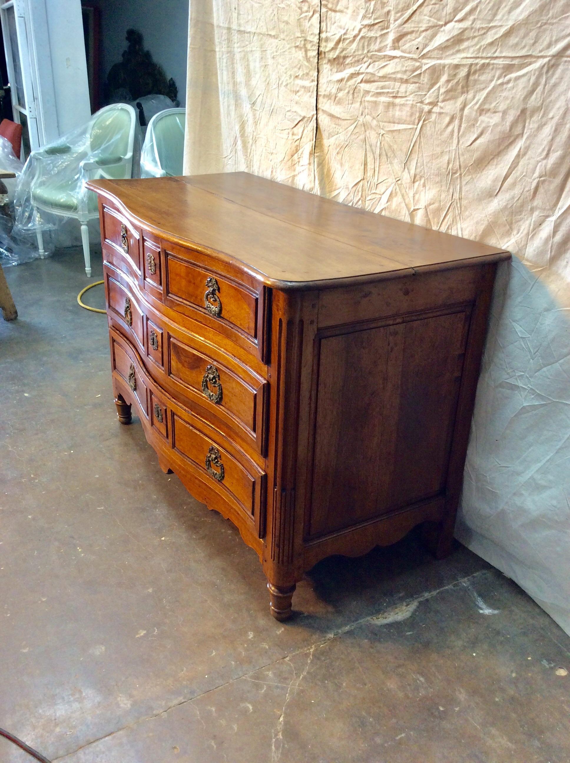 Hand-Crafted 1800s French Walnut Four Drawer Commode For Sale