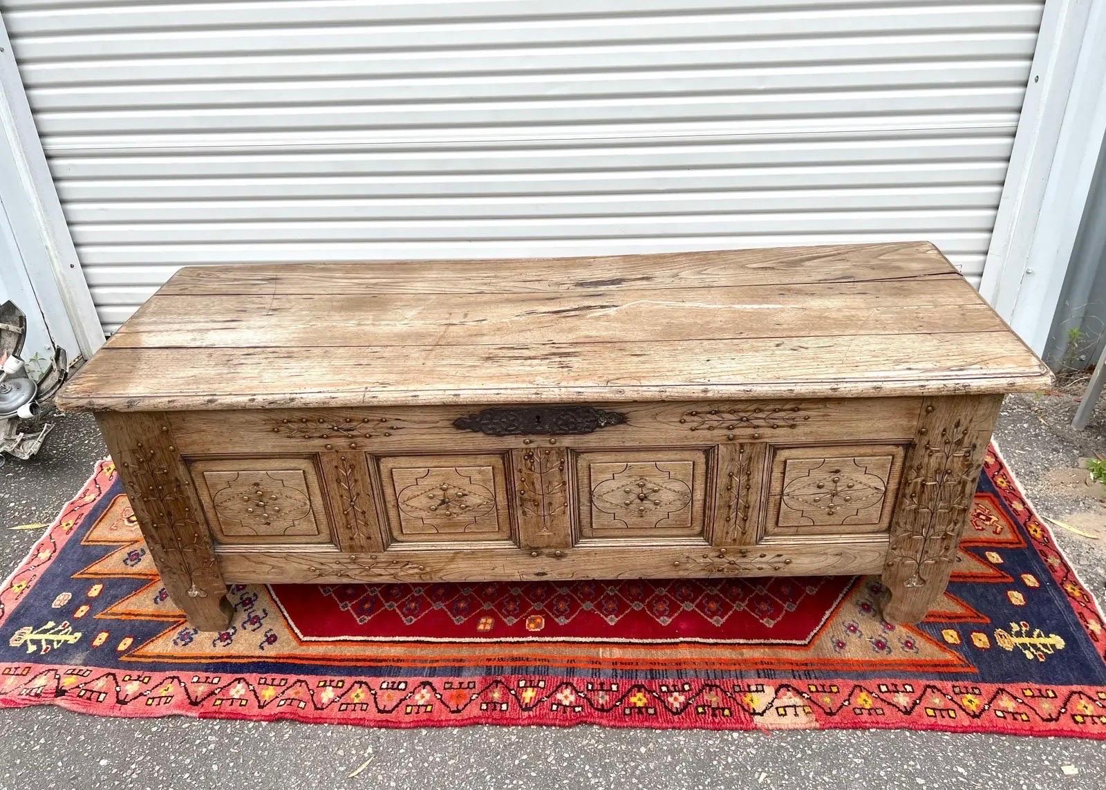 circa 1800s - Could be earlier either from a church or otherwise a sword coffer. Lovely dry condition and color. Would make a lovely bench/chest at the end of the bed or entryway. Very sturdy. All original hardware. Hand carved.