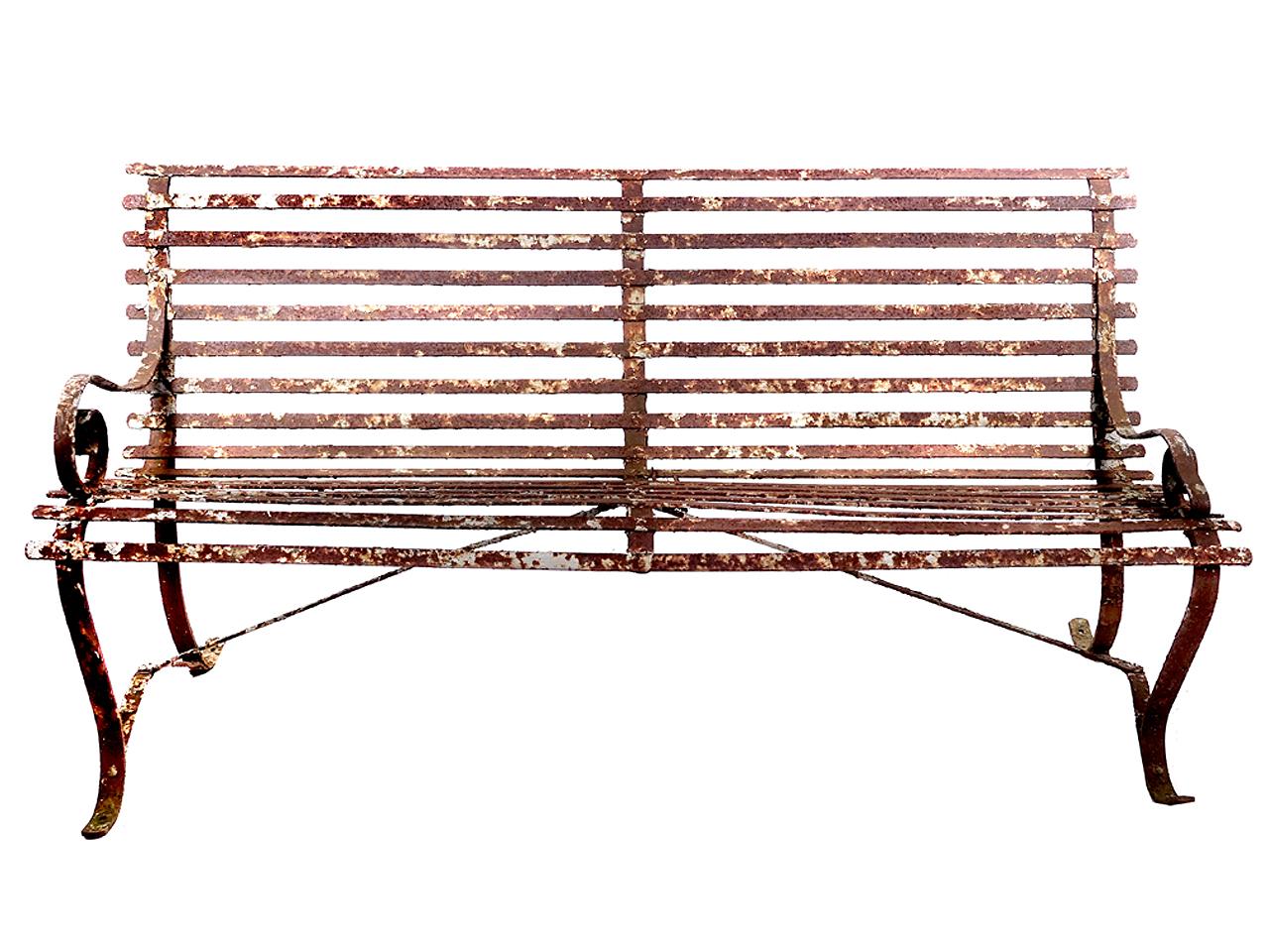 This is the real thing and its solid with the original rustic patina. All the joints are hand-riveted as they should be for a bench this early. The finish is as found. Add a piece of history to your yard or front porch but don't wear white paints.