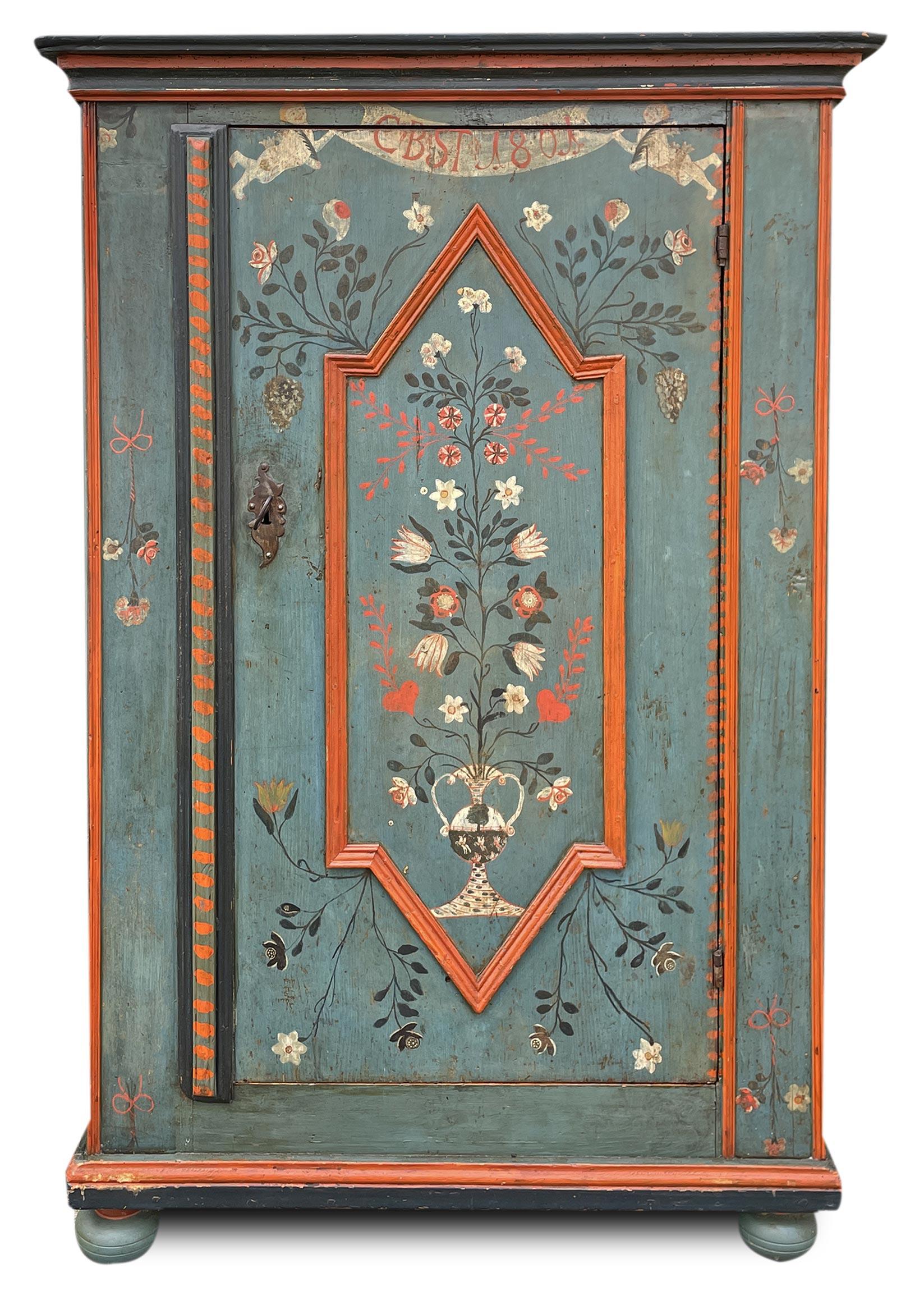 Blue Stipo wardrobe dated 1801

Measurements: H. 147 cm - L. 92 cm (102 cm at the frames)  - D. 38 cm (44 cm at the frames)
Essence: Fir
Period: 1801
Origin: Tyrol

Description:
Tyrolean Stipo wardrobe, with one door, entirely painted in teal
