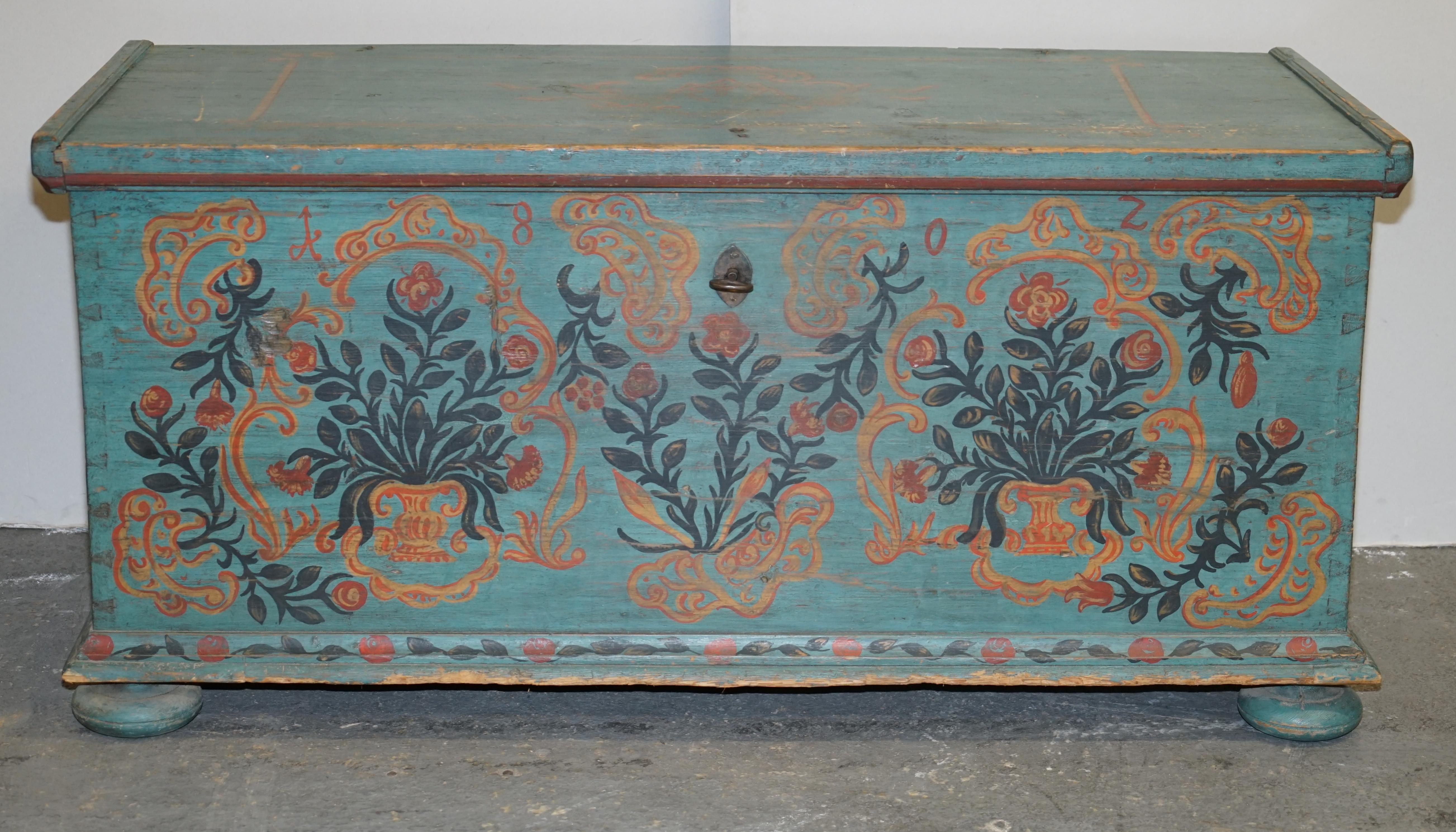 We are is delighted to offer for sale this stunning, extra large circa 1802 dated aqua blue hand painted European clothes trunk or marriage coffer chest

I have recently purchased a very large collection of these original, antique painted