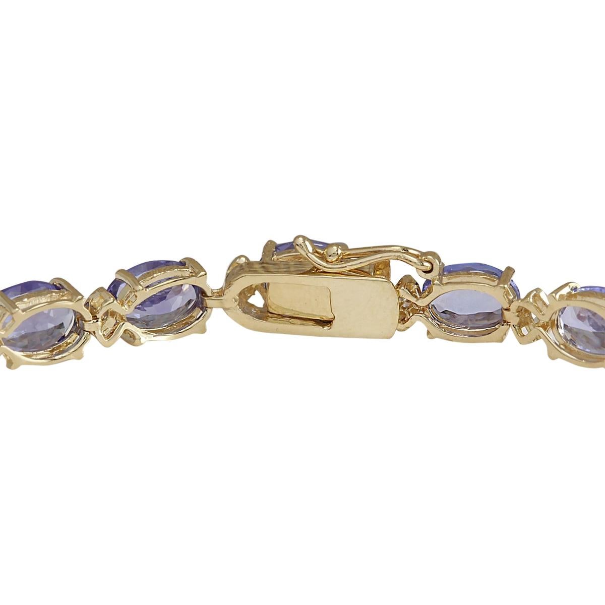 Indulge in opulent elegance with our 18.03 Carat Natural Tanzanite 14 Karat Yellow Gold Diamond Bracelet. Crafted from 14K Yellow Gold and stamped for authenticity, this exquisite piece weighs 12.0 grams, ensuring both durability and luxury.
With a