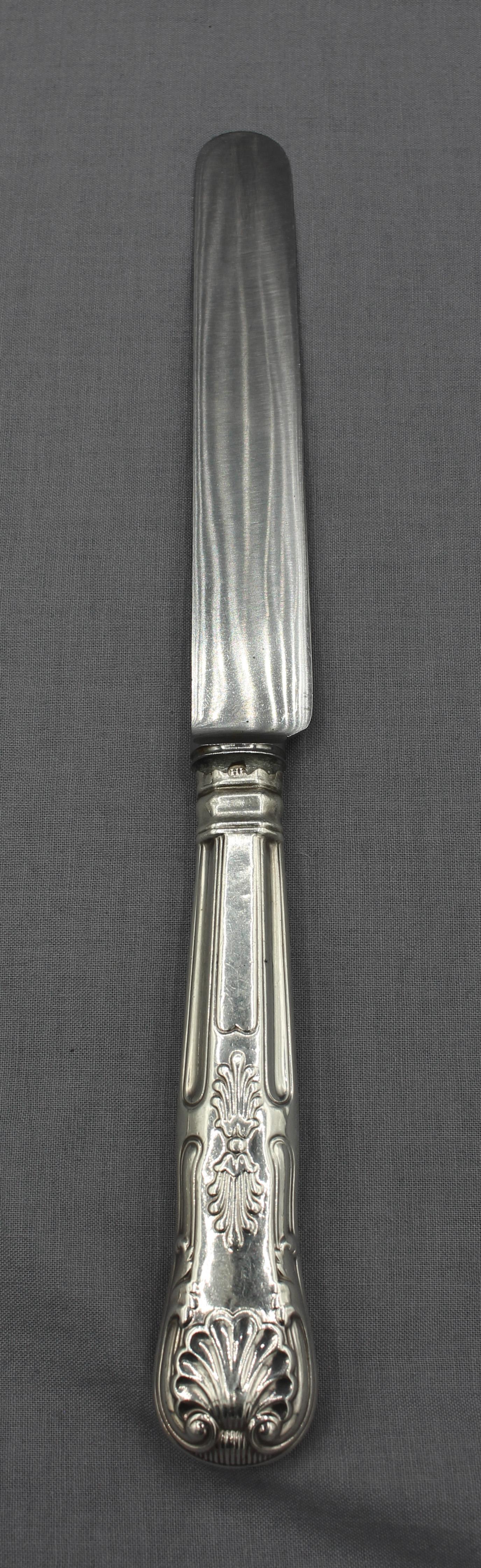 Set of 8 King's pattern dinner knives, London 1803. Hollow sterling silver handles with later Chrichton & Co Ltd. steel blades. Indistinct marks - London 1803 (H) and maker 